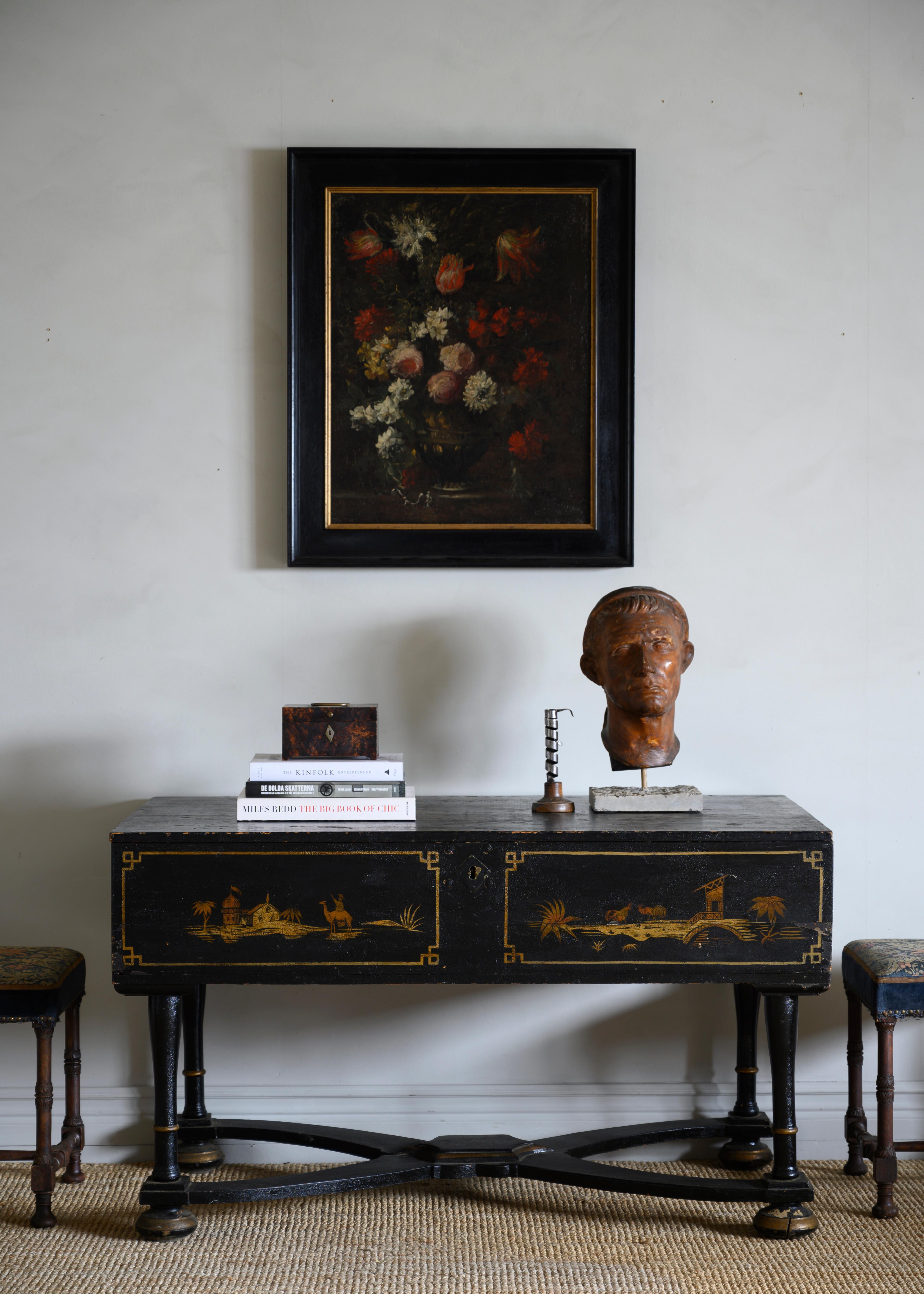 18th century Swedish late Baroque chinoiserie console table with a storage compartment under the top, circa 1750 Sweden 

The console has been re-lacquered circa 1830 and shows light scratches and wear from previous use but remains in fair