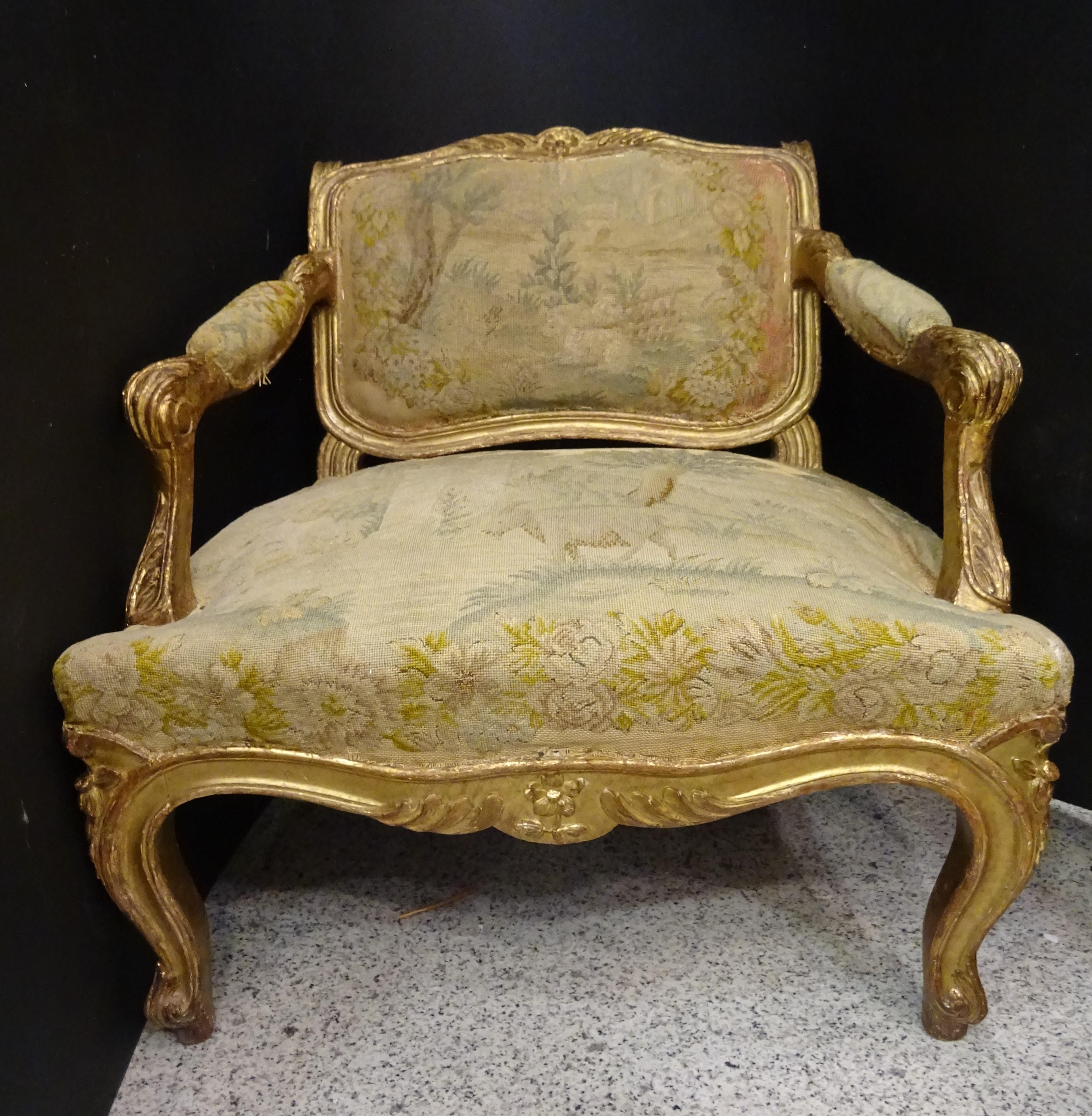 Amazing French armchair in carved and gilded wood, upholstered with a tapestry 
