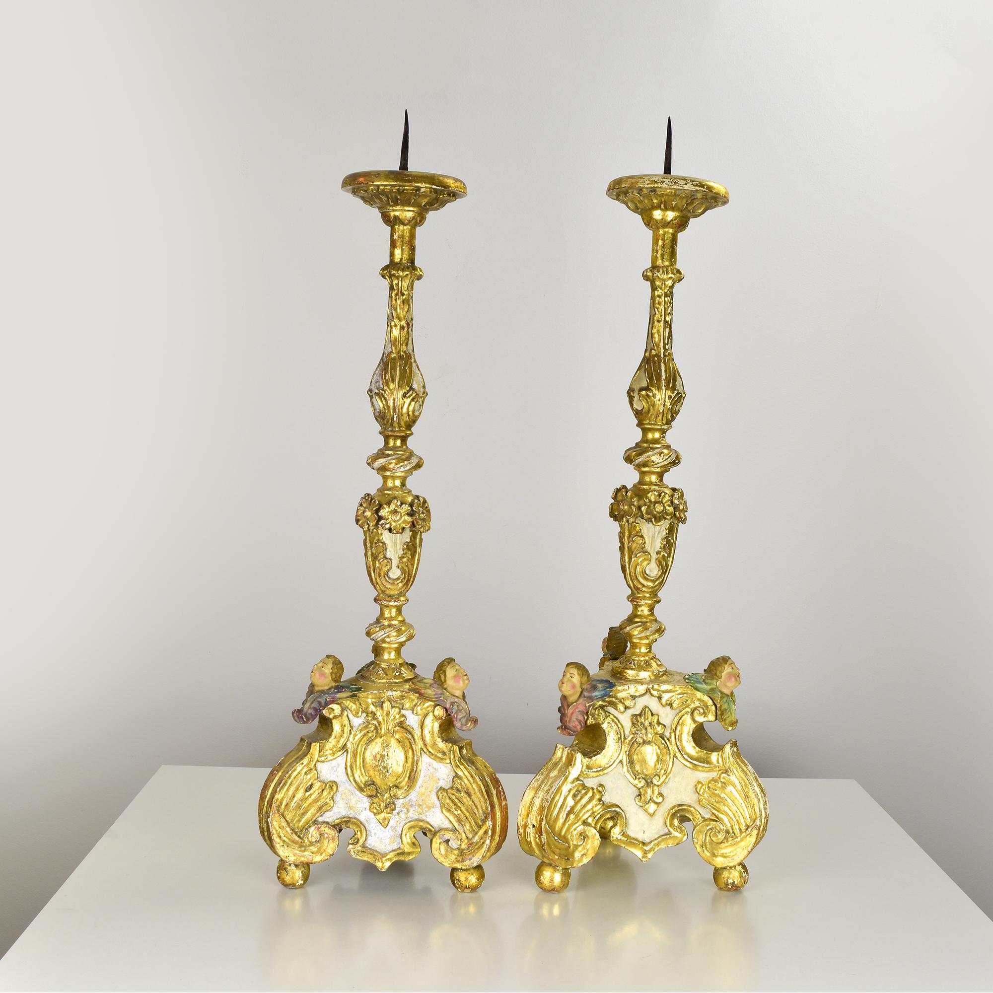Carved 18th Century Baroque Giltwood Candleholders with Putti Decorations For Sale