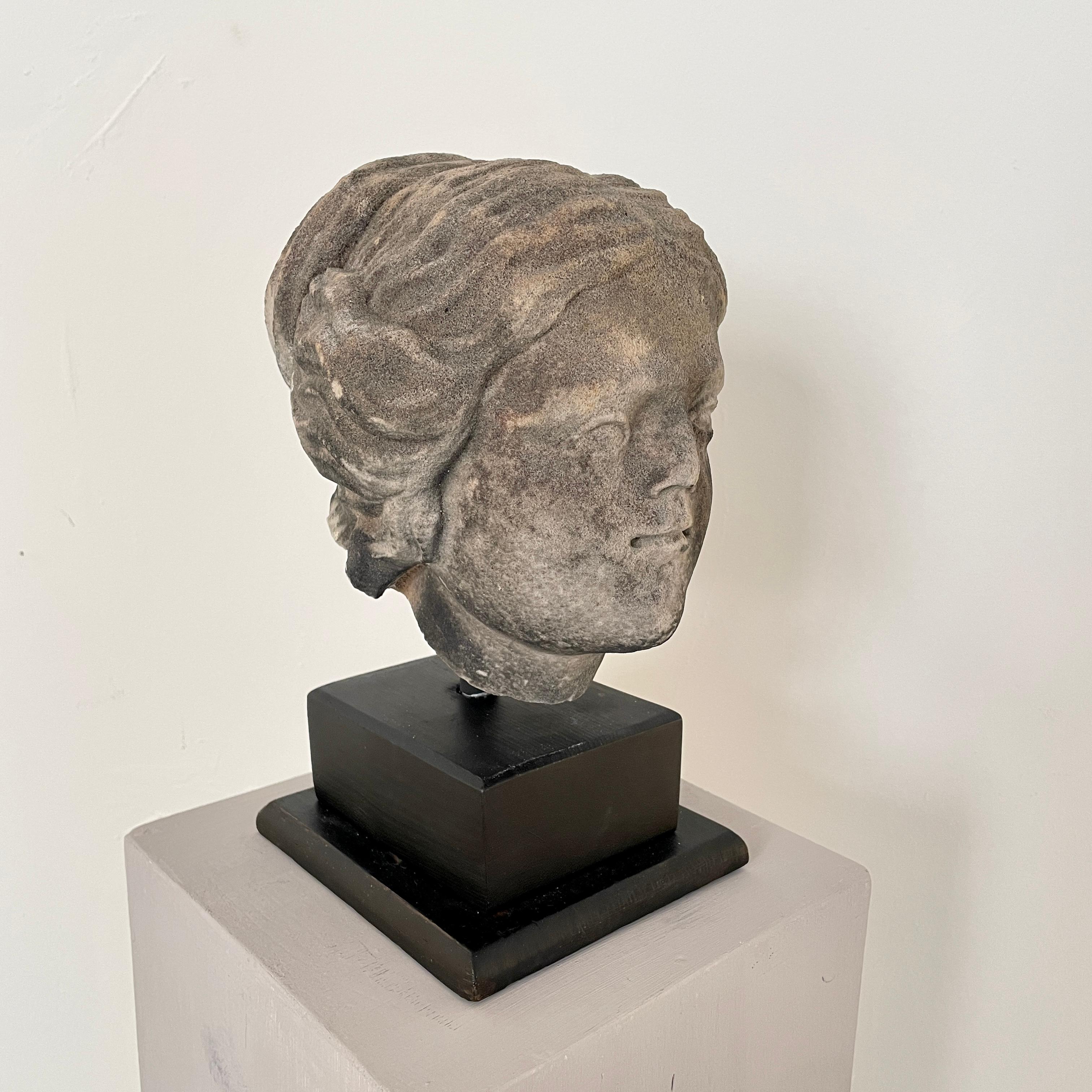 French 18th Century Baroque Grey Sandstone Head of a Woman on a Black Base, Around 1780