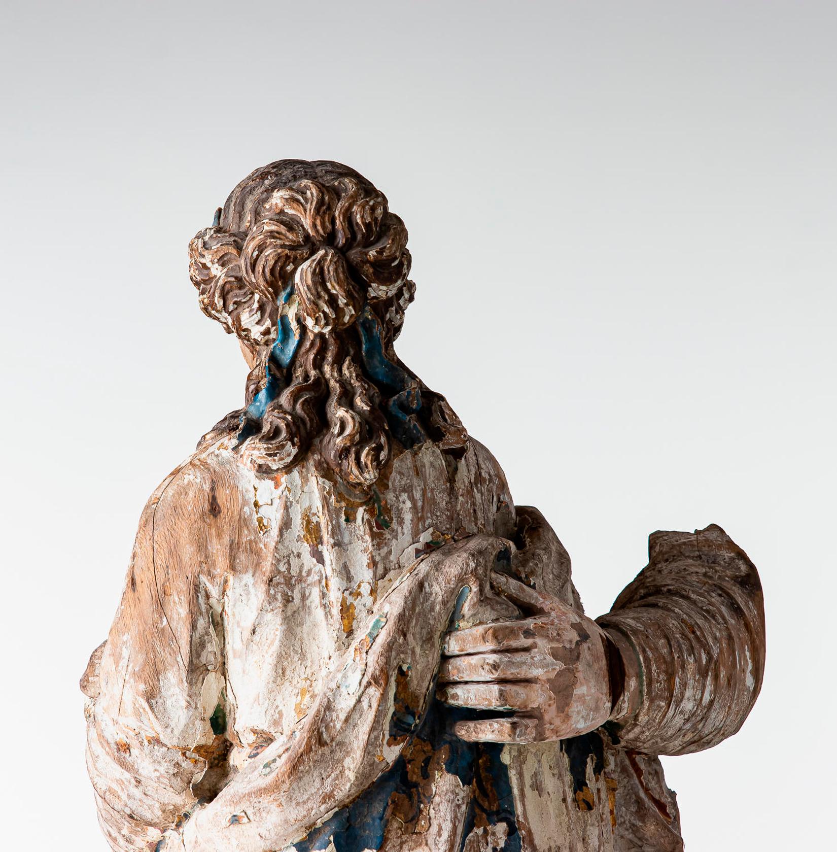 18th century, Baroque, Italian school, sculpture carved in wood.
European oak painted sculpture with patina, early 18th century. Probably part of a larger sculpture, you can see a hand holding her waist. Damage and color loss.
The woman pictured