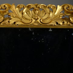Miroir en bois doré sculpté d'époque baroque du 18e siècle