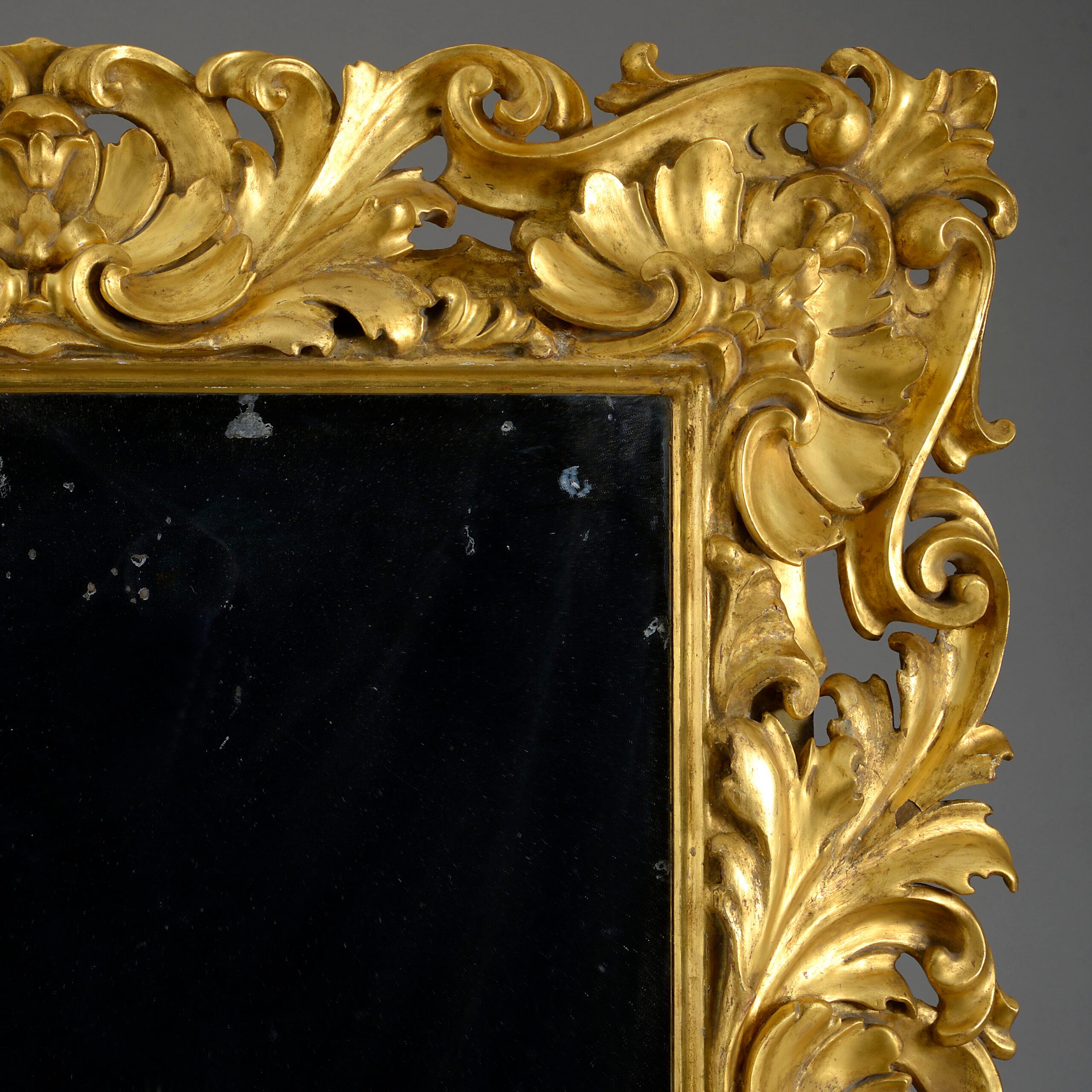 Italian 18th Century, Baroque Period Carved Giltwood Mirror For Sale