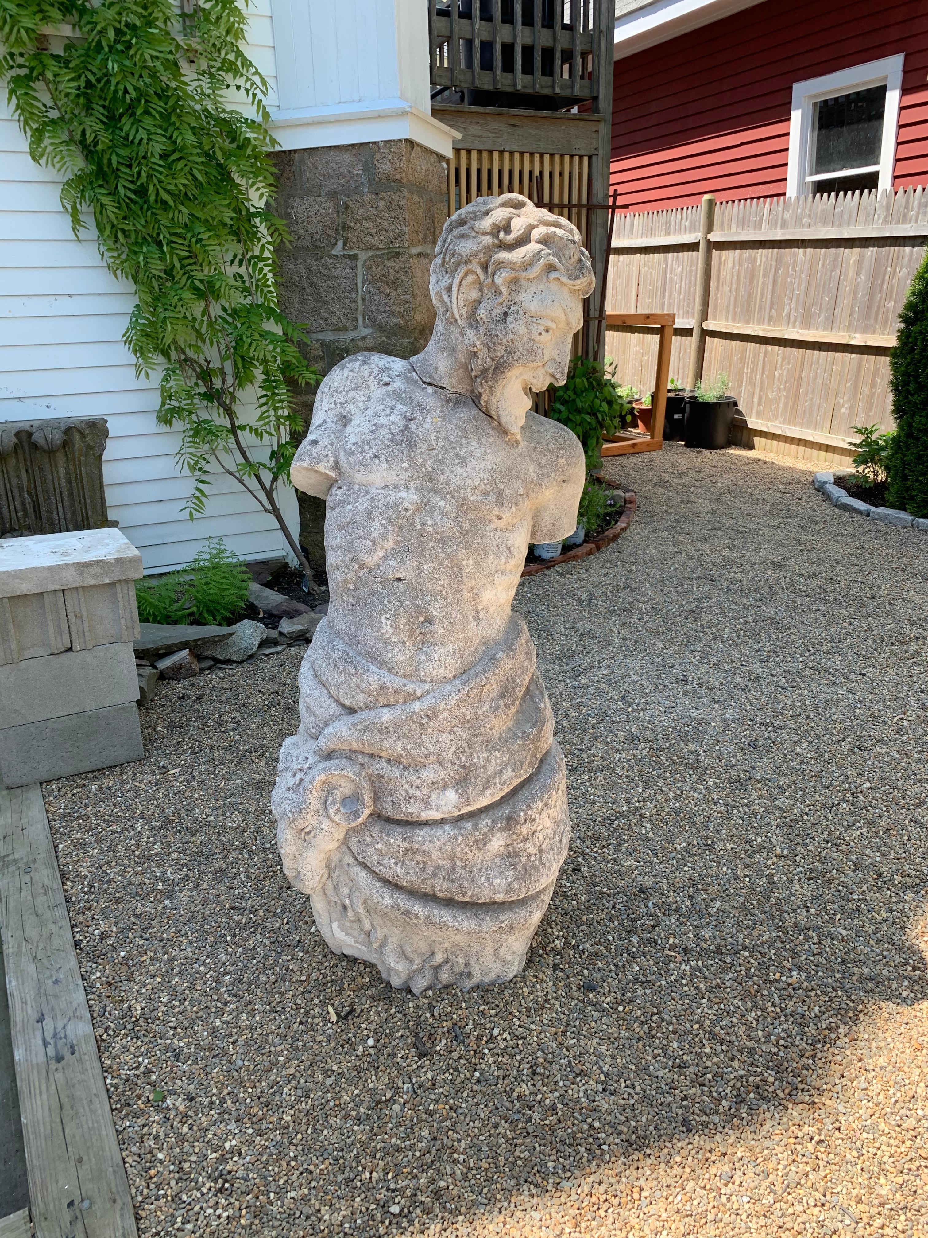 A Period German or French large scale Baroque Garden Statue of a Pan Satyr. Well carved with impish gaze and wrapped in sheepskin

Ex Prominent New York Collection through Christies
Ex Solitude Villa, Manchester-by-the-Sea, MA.