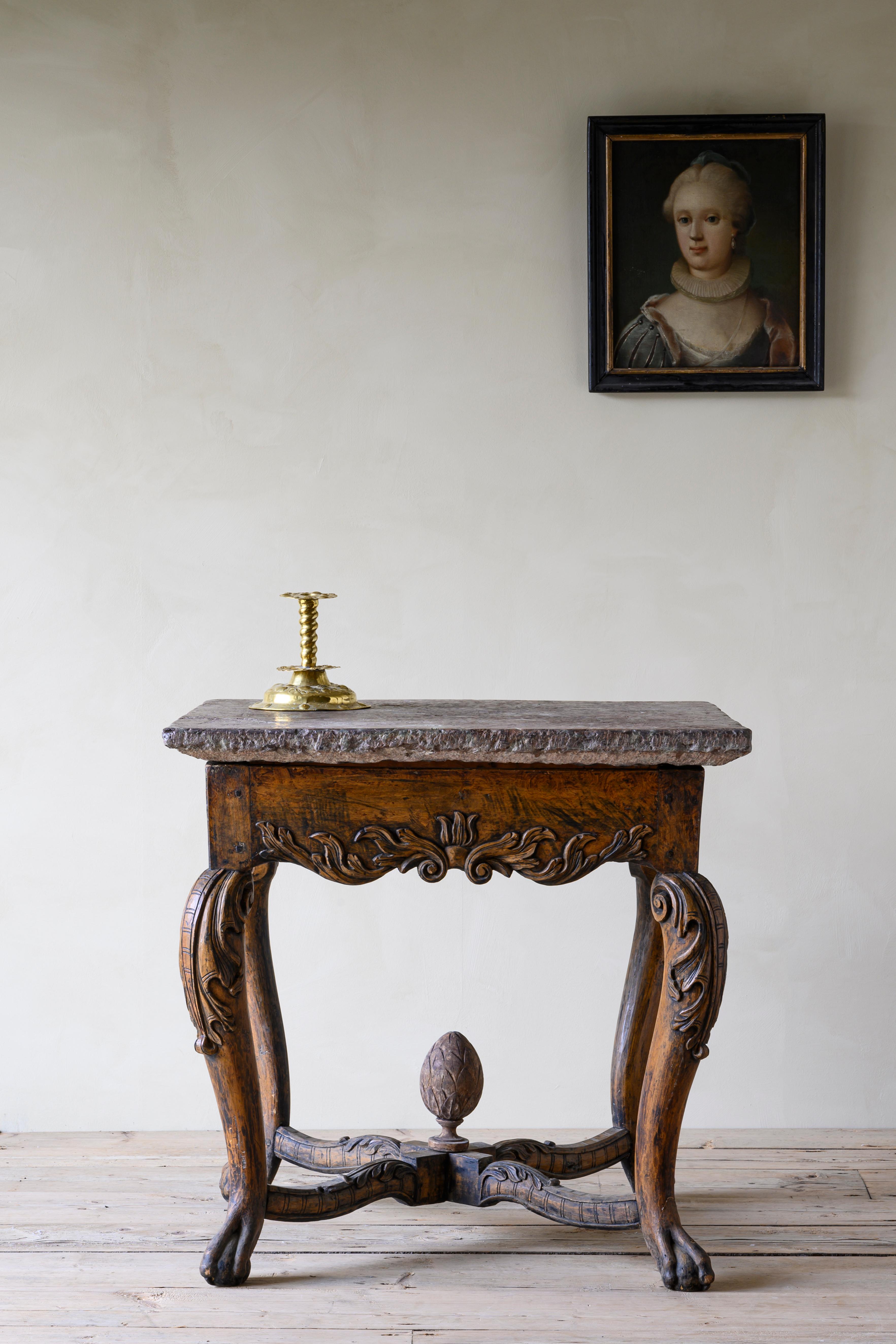 18th century Baroque stone top table with good proportions and fine carvings, North Europe / Scandinavia, circa 1740.

Good condition with wear consistent with age and use. Original finish. Structurally good and sturdy.