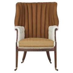 18th Century barrel back fluted English wing chair