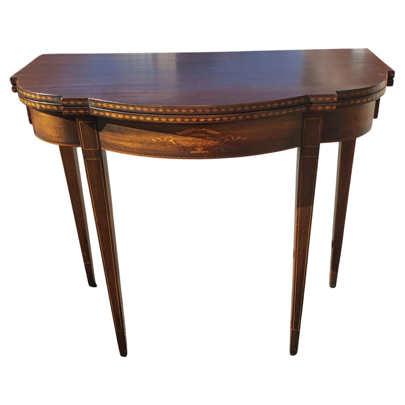 For your consideration is this English Sheraton Console game table, from the 18th Century Beacon Hill Collection. 
This table is made of Mahogany wood , banded inlaid on the sides supported with four strong legs beautifully inlaid. The back legs