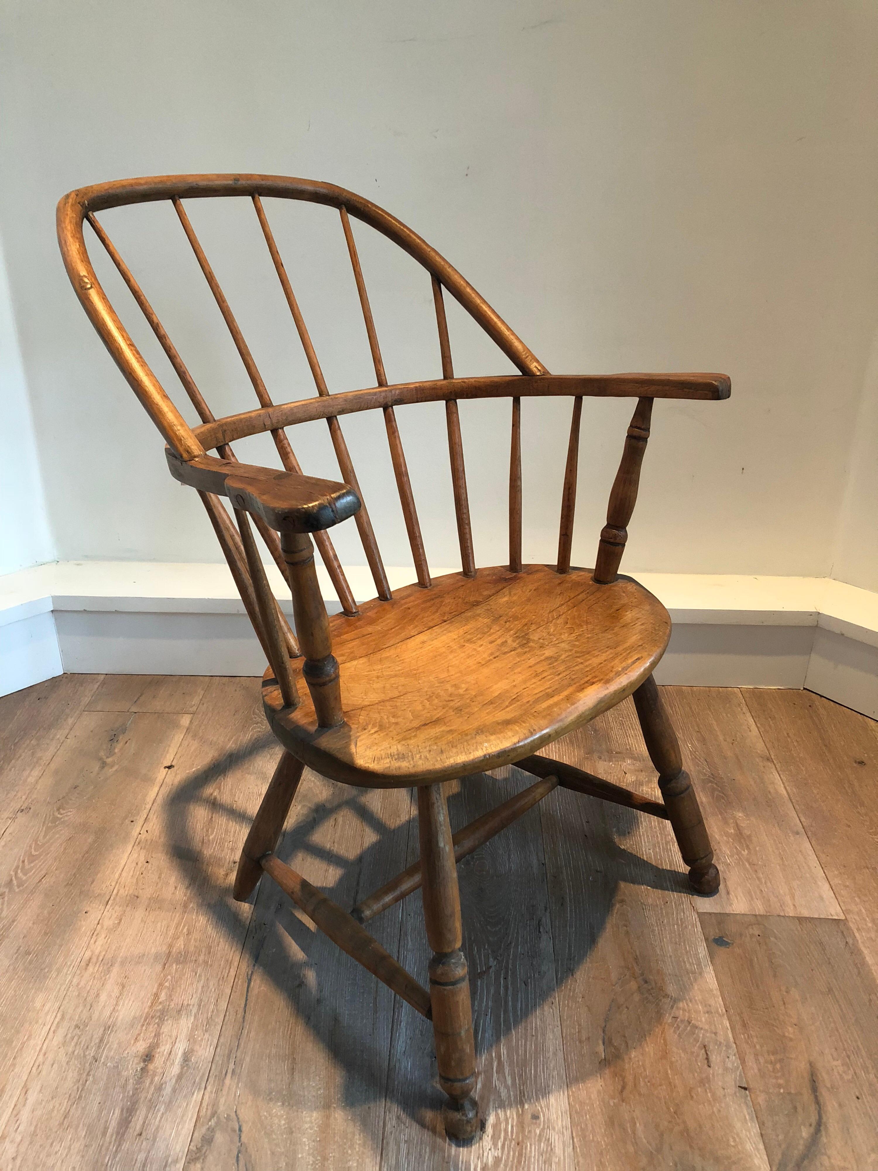 An interesting late 18th century elm Windsor chair. Interesting and rare continuous bentwood hoop back construction.