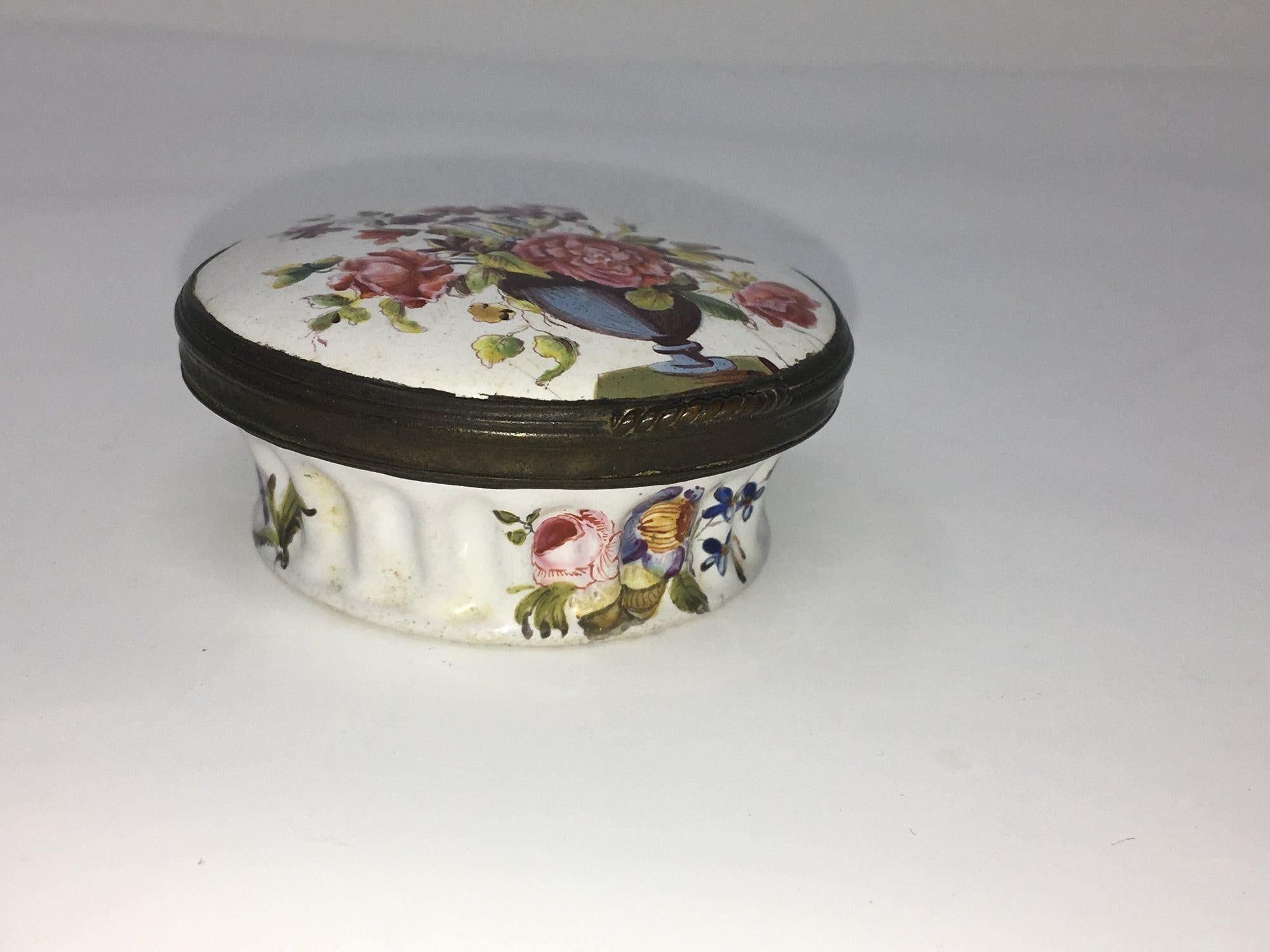 Stunning floral English Bilston or Battersea Enamel bonbonniere, enamel on copper, with unusual spider web design to underside, circa 1760. This could also be a patch box, but is larger in size than these generally are. Painting is of especially