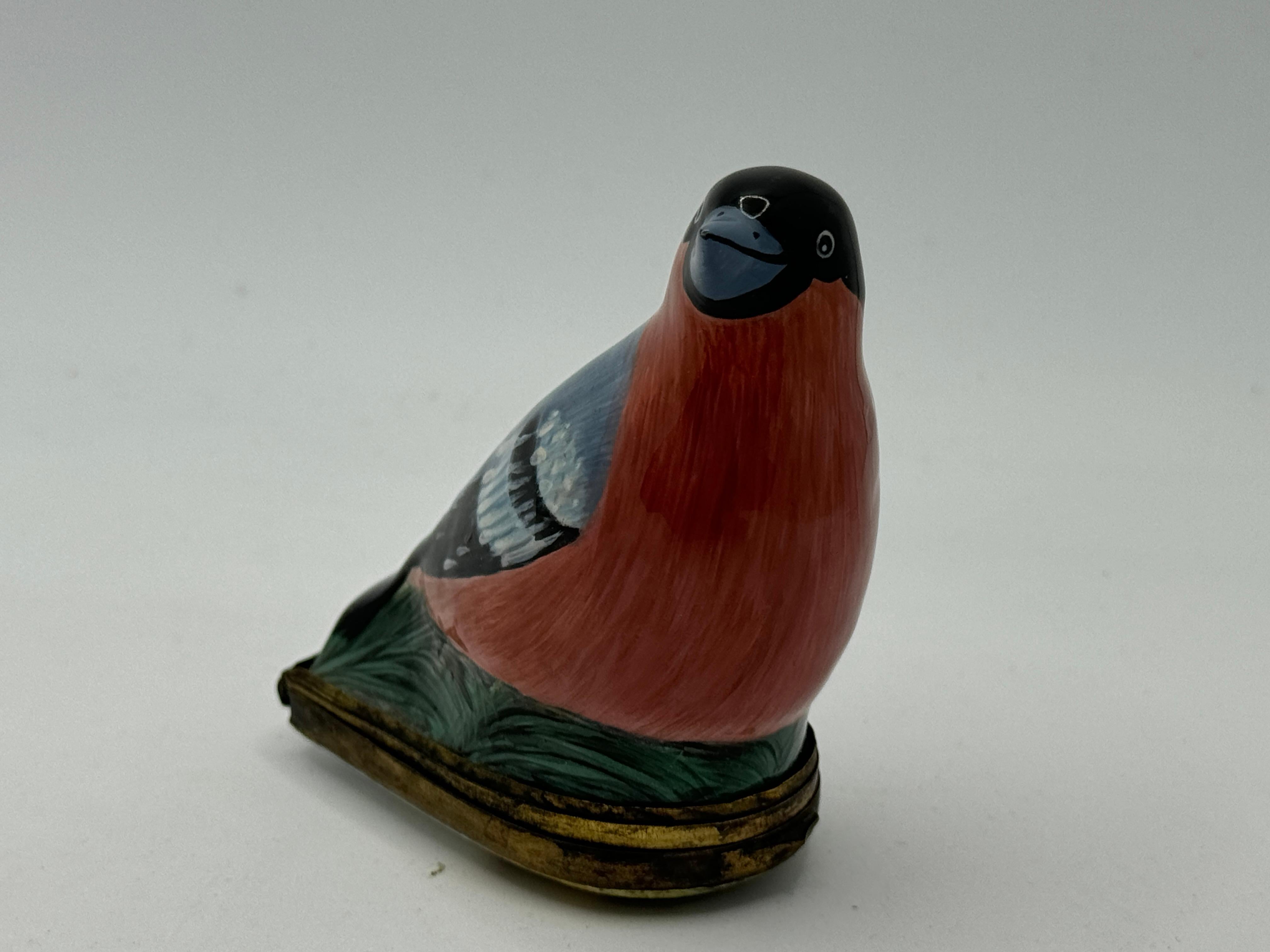 18th Century South Staffordshire Bilston Enamel Bird Patch Box, in the form of a Robin, perched on green base, the lid painted with a couple of fowl birds, Circa 1760