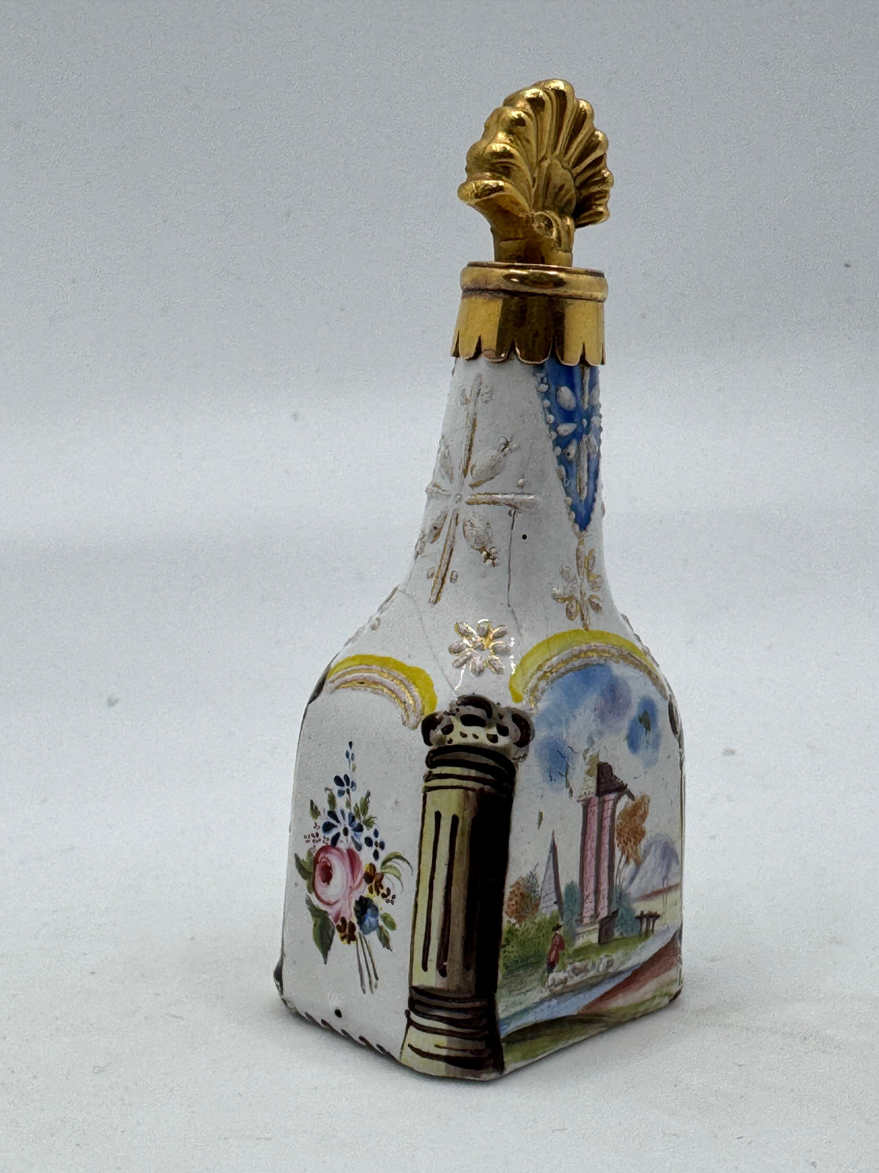 18th Century Bilston English Enamel Scent Flask, circa 1760, Decorated with white enamel and gilt and yellow borders. Architectural column cartouche containing two landscapes to front and back with floral sprays to either side. Gilt metal stopper