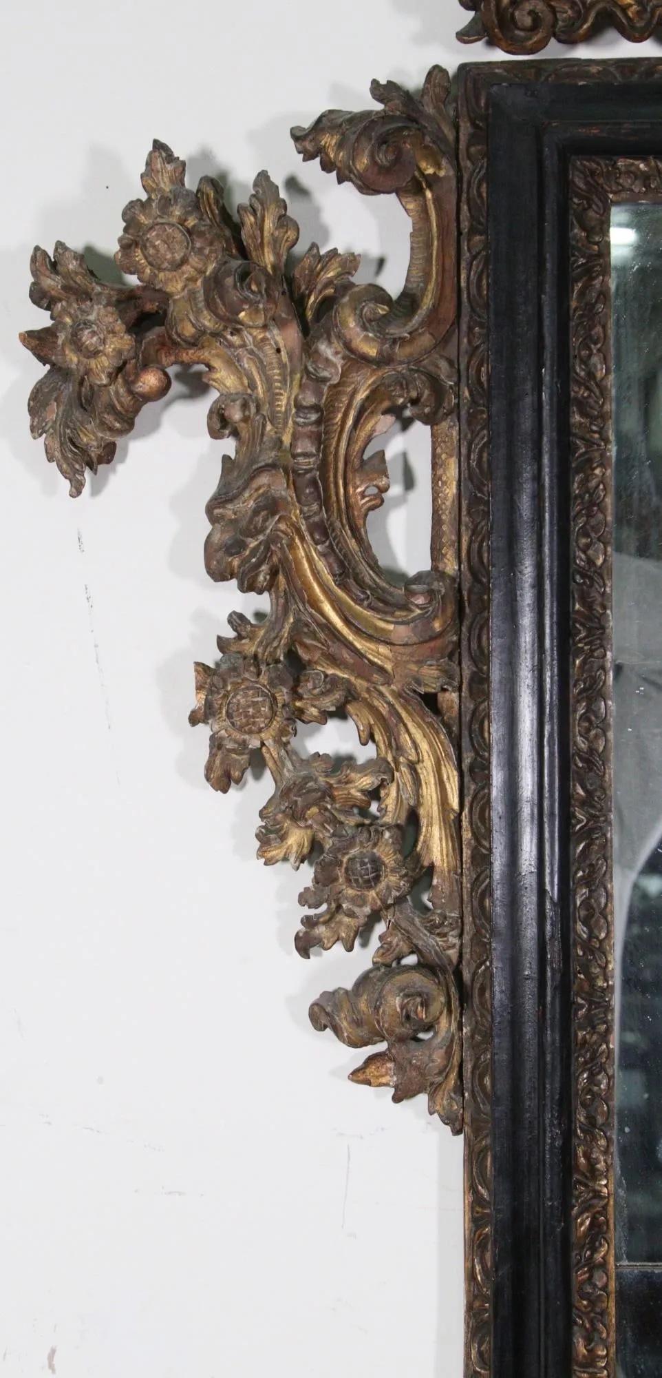 Baroque 18th Century Black and Gilt Italian Mirror For Sale