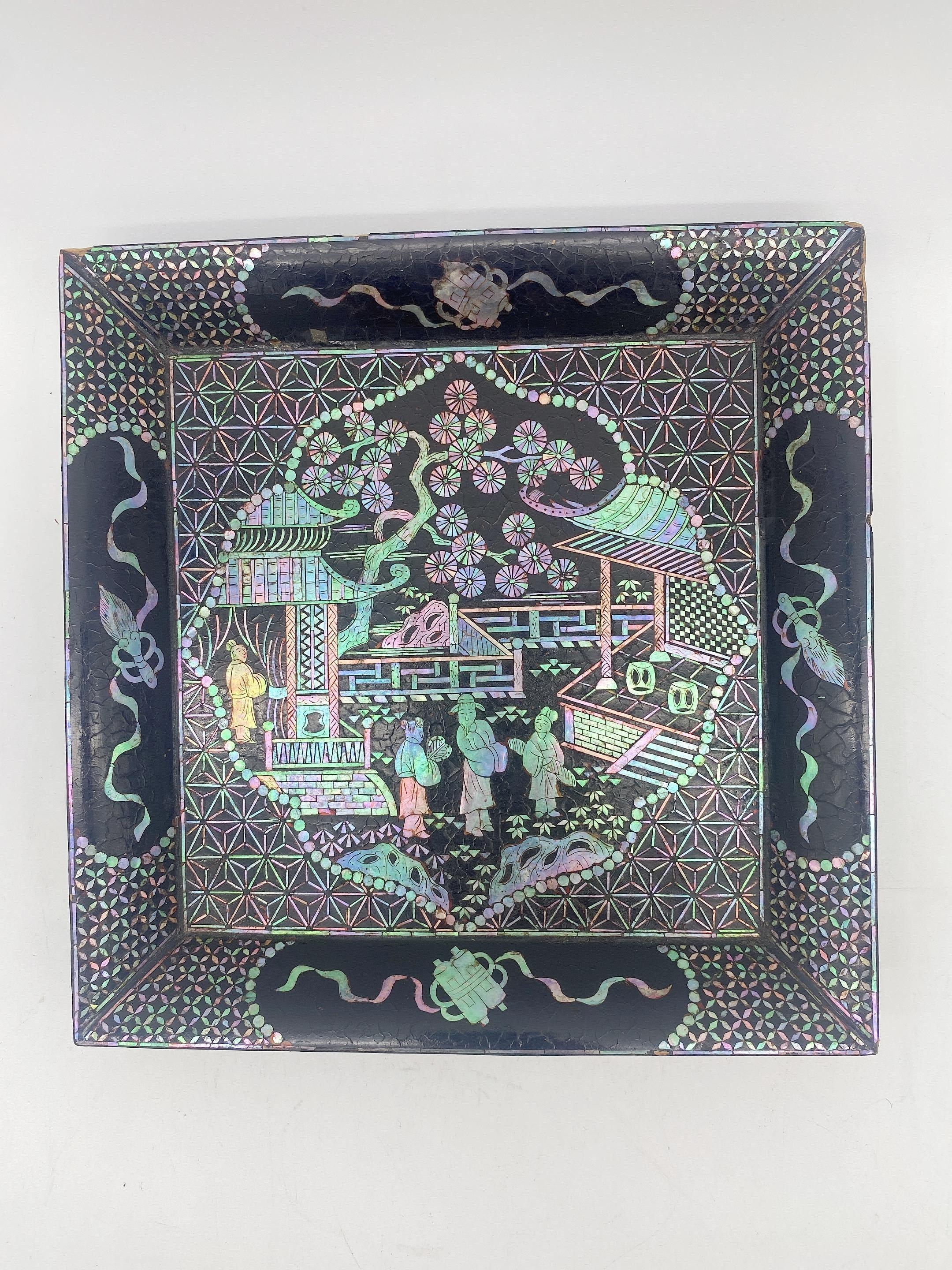 18th century black lacquer mother of pearl inlay plate, decoration as expected for age and use. Very beautiful and hard to find like this. Size: L 21cm x W 21cm.