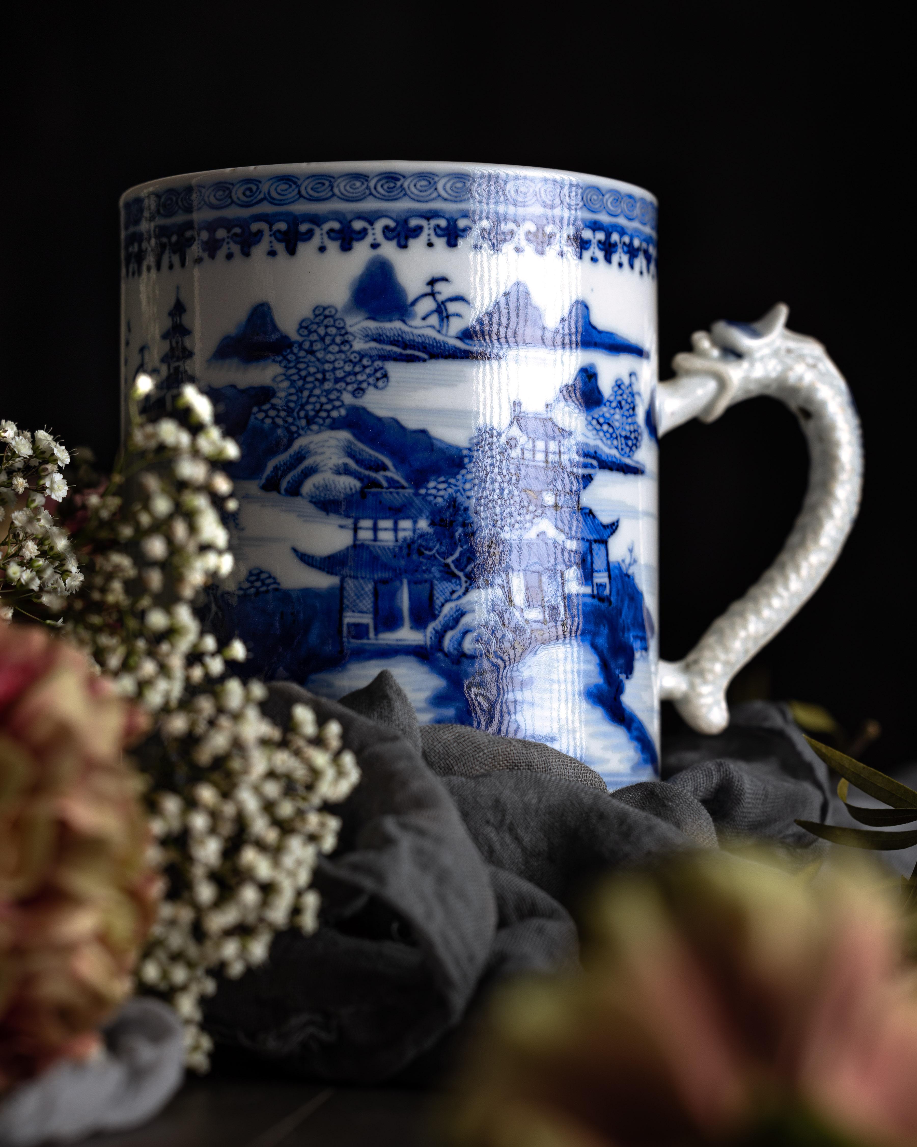 A Chinese export porcelain mug, beautifully painted in the ‘Nanking’ pattern and made during the Qianlong Period circa 1790.

This Chinese export porcelain mug is beautifully painted in cobalt blue glaze. The central design shows the ‘Nanking’