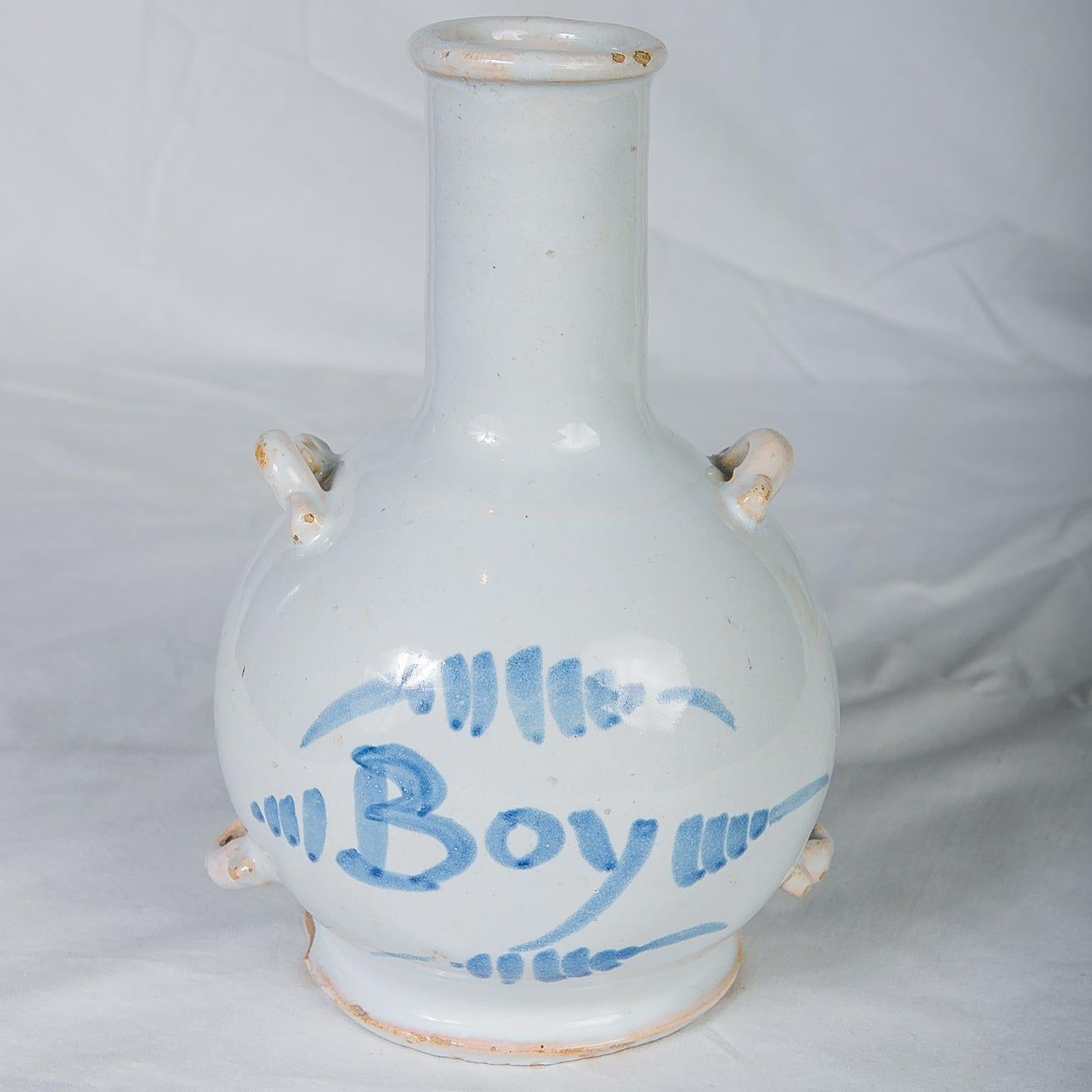 Bouteille de Delft bleue et blanche du 18ème siècle portant l'inscription 