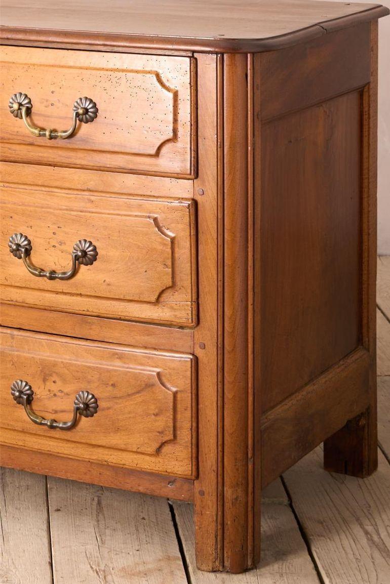 This is a great looking late 18th early 19th century Bow fronted chest of drawers. I believe Spanish in origin and looks to be made from walnut. The handles have been replaced but with age appropriate replacements. Great overall condition and an