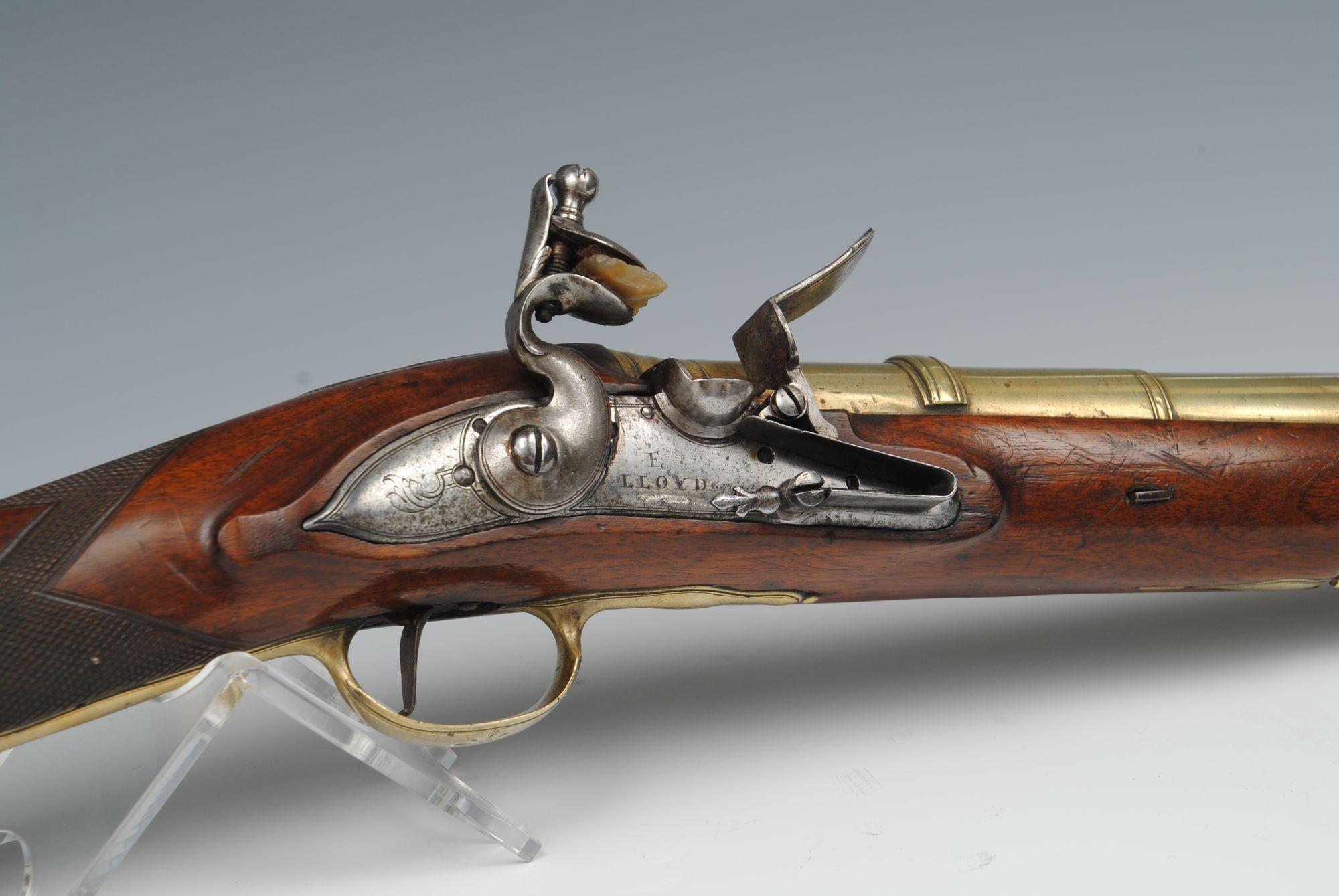 A good brass barrelled flintlock blunderbuss by LLoyd, London with a well figured walnut stock fully brass mounted 
Circa 1770
Barrel length 36cm, overall length 78cm 