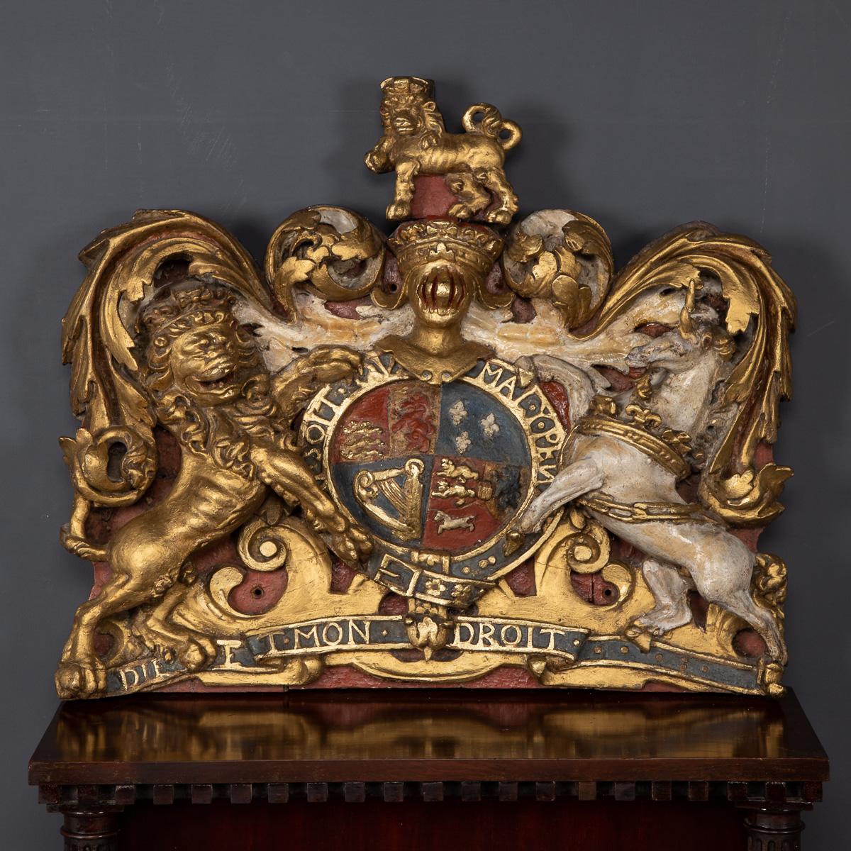 18th Century English (Queen Anne - King George III) large and impressive, Royal coat of arms, hand carved wood and painted. Depicting the Hanoverian Royal coat-of arms with unicorn and lion supporters and motto, Dieu et mon droit (French), meaning