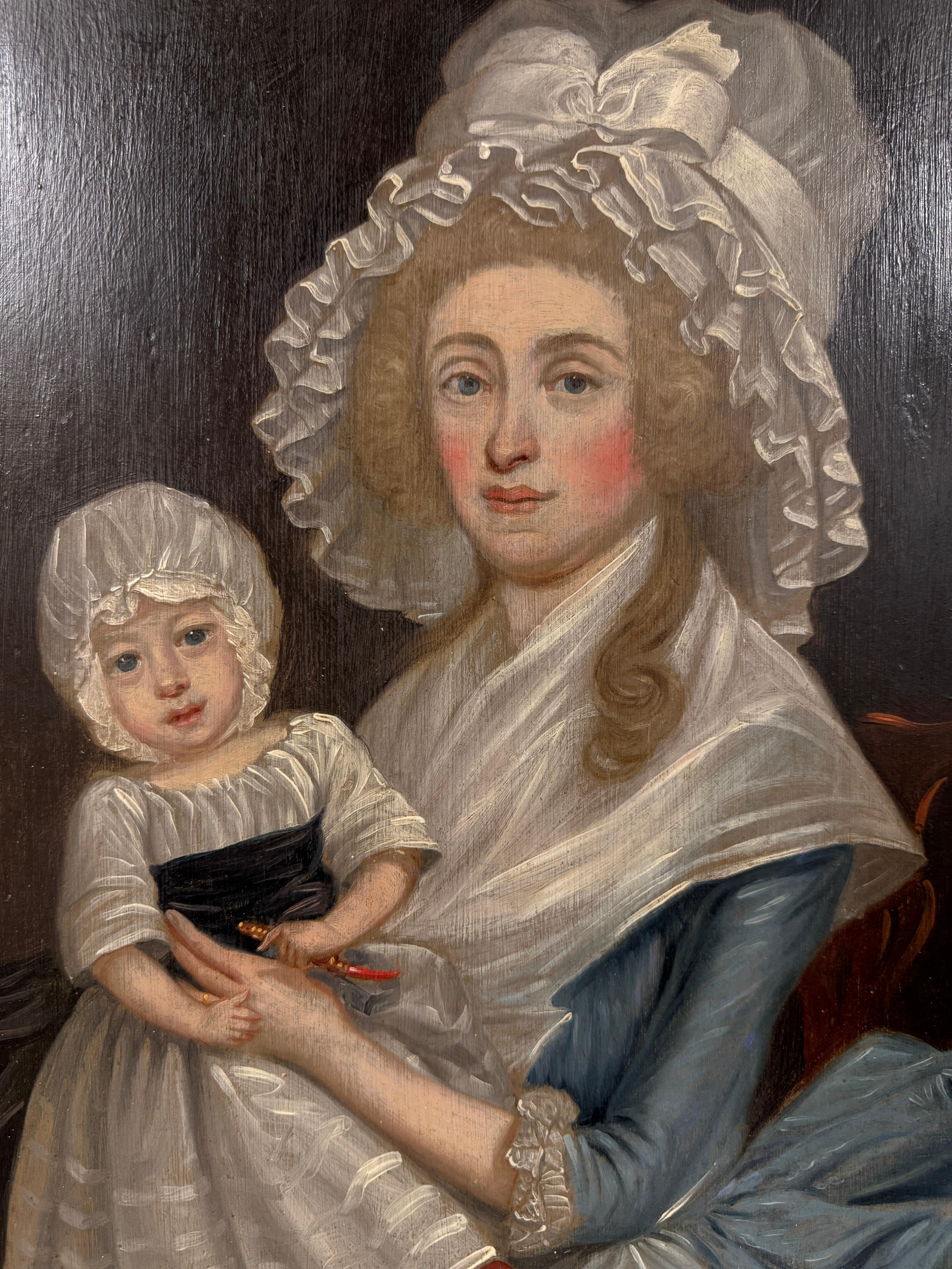 Siglo XVIII Escuela Británica, Retrato de Dama y Niño, óleo pintado sobre tabla en estilo naïf, enmarcado en un marco dorado. 

Una antigua nota manuscrita parcial en el reverso del cuadro parece indicar que el sujeto del cuadro es la Sra. Mary