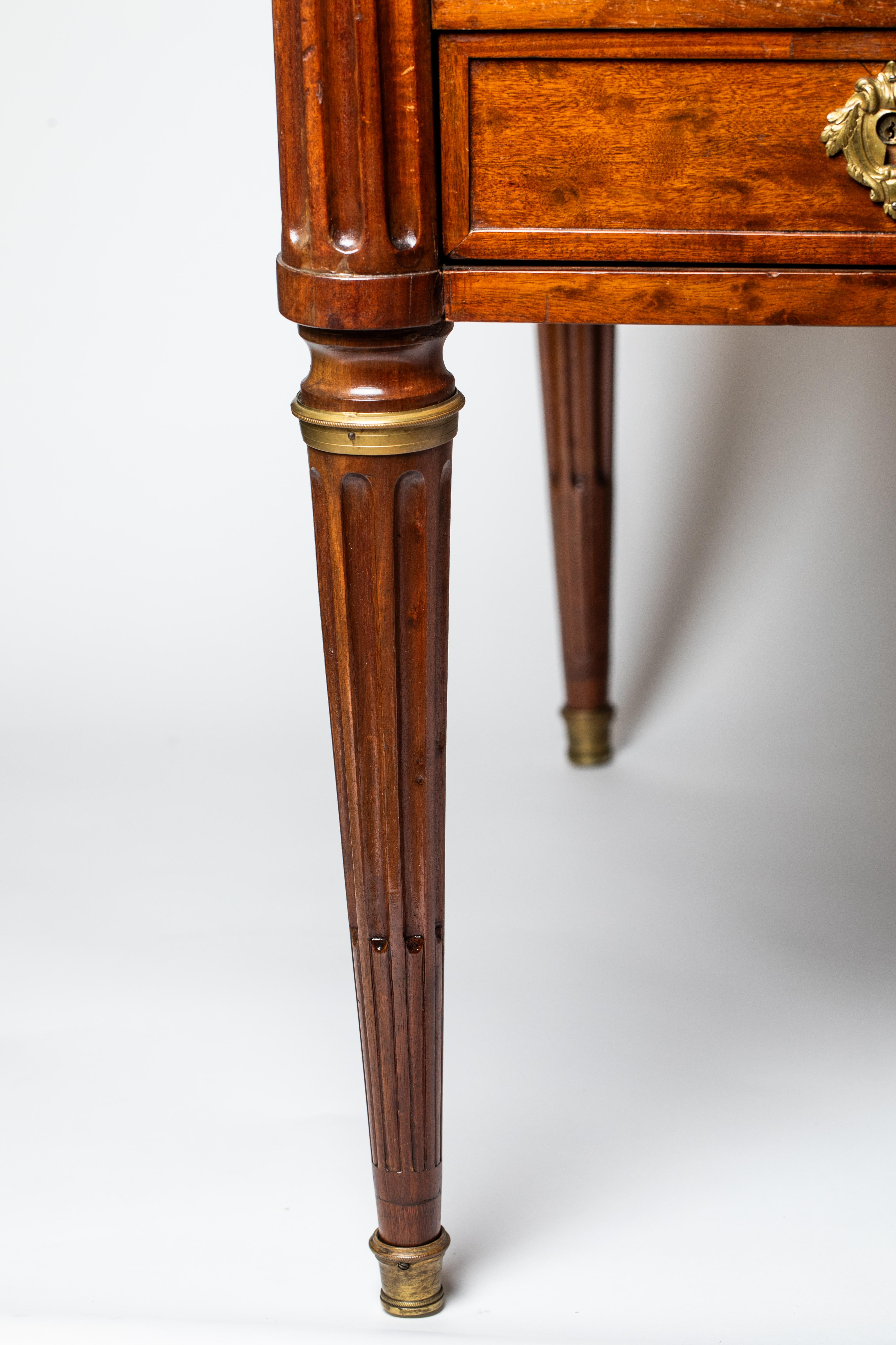 A bureau plat from the late 18th century, made around 1780 in the French style, epitomises the timeless elegance and craftsmanship of furniture design from this era. Made from fine mahogany, a popular wood of the era, this piece of furniture exudes
