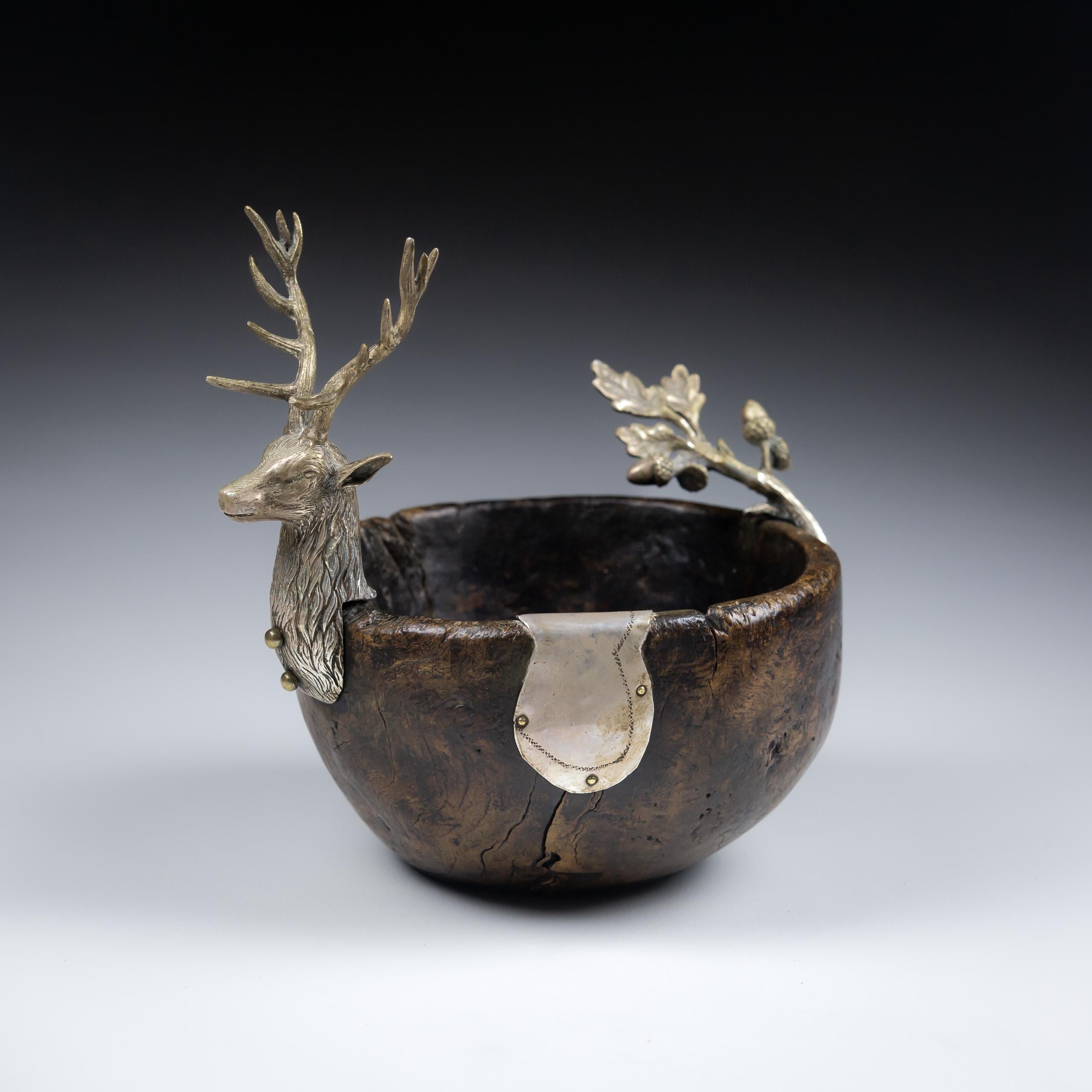 18th Century Treen Oak bowl with impressive patination, adapted (most likely late 19th or Early 20th Century) with applied Stag Head and Oak and acorn Tail. Several historical repairs, one in impressive silver plate.

Continantal,  Circa 1780 with