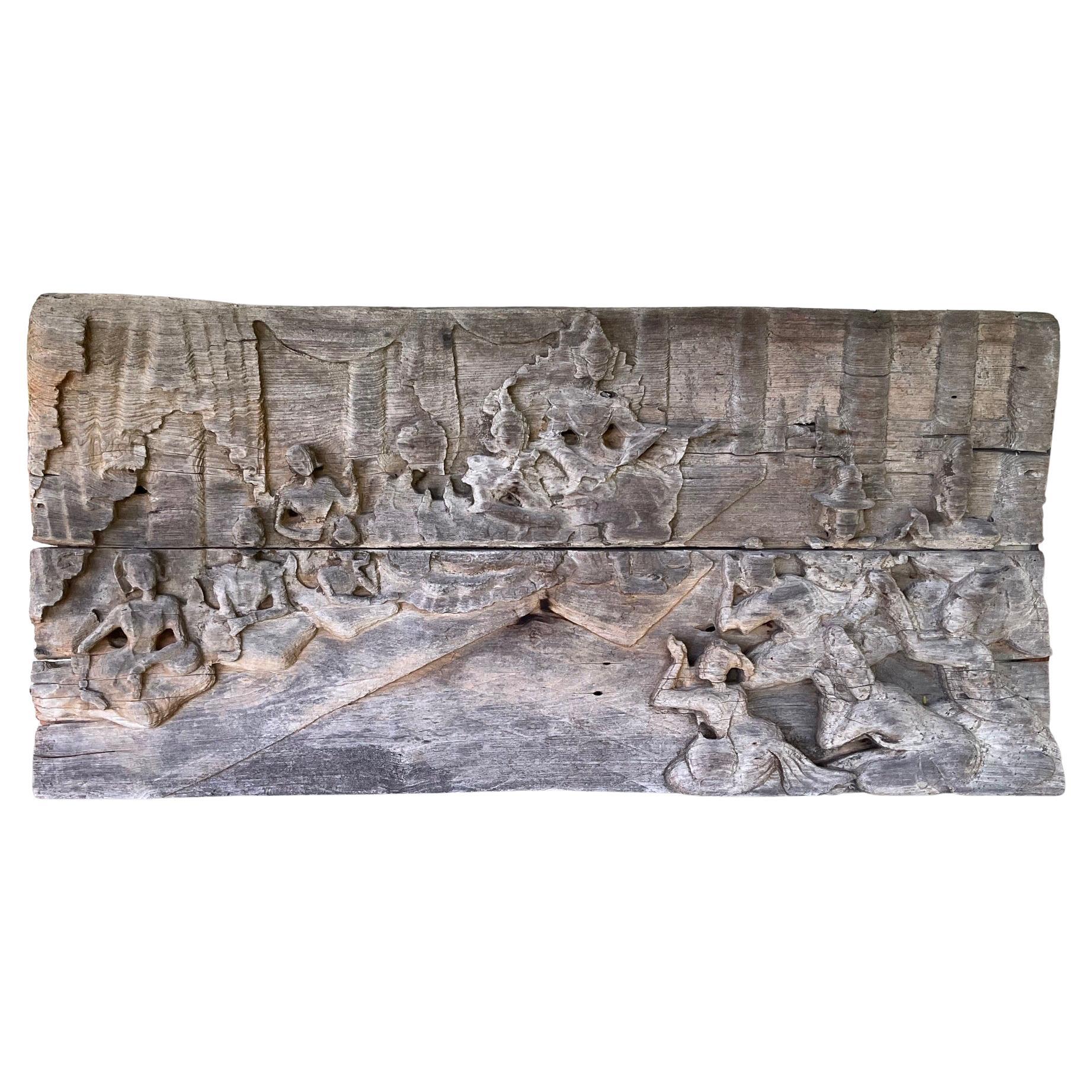 Panneau en teck sculpté birman du XVIIIe siècle - Scène de la vie du Bouddha