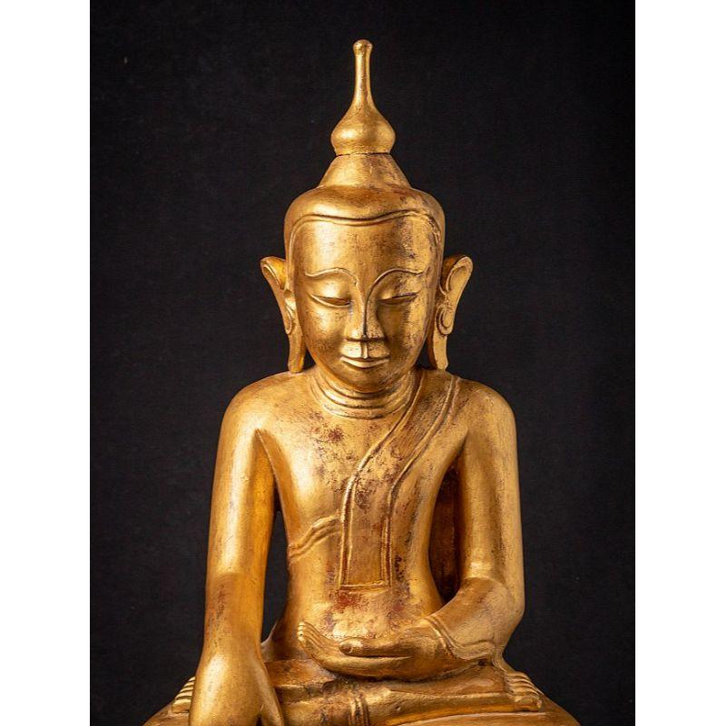 Material: wood
74,5 cm high 
41 cm wide and 29,5 cm deep
Weight: 13.4 kgs
Gilded with 24 krt. gold
Shan (Tai Yai) style
Bhumisparsha mudra
Originating from Burma
18th century
Very special !.

