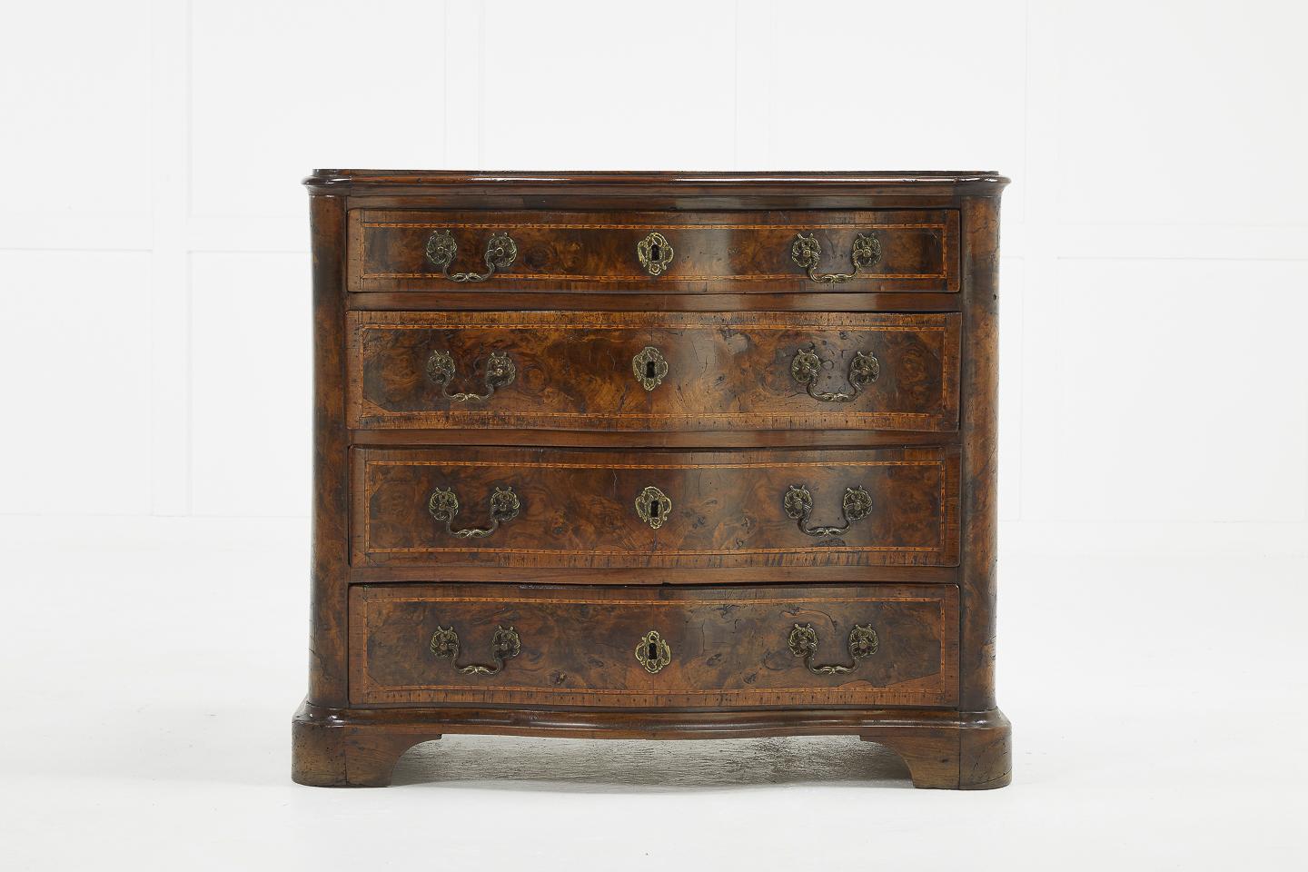 Very nice small proportioned 18th century burr walnut commode with four drawers.