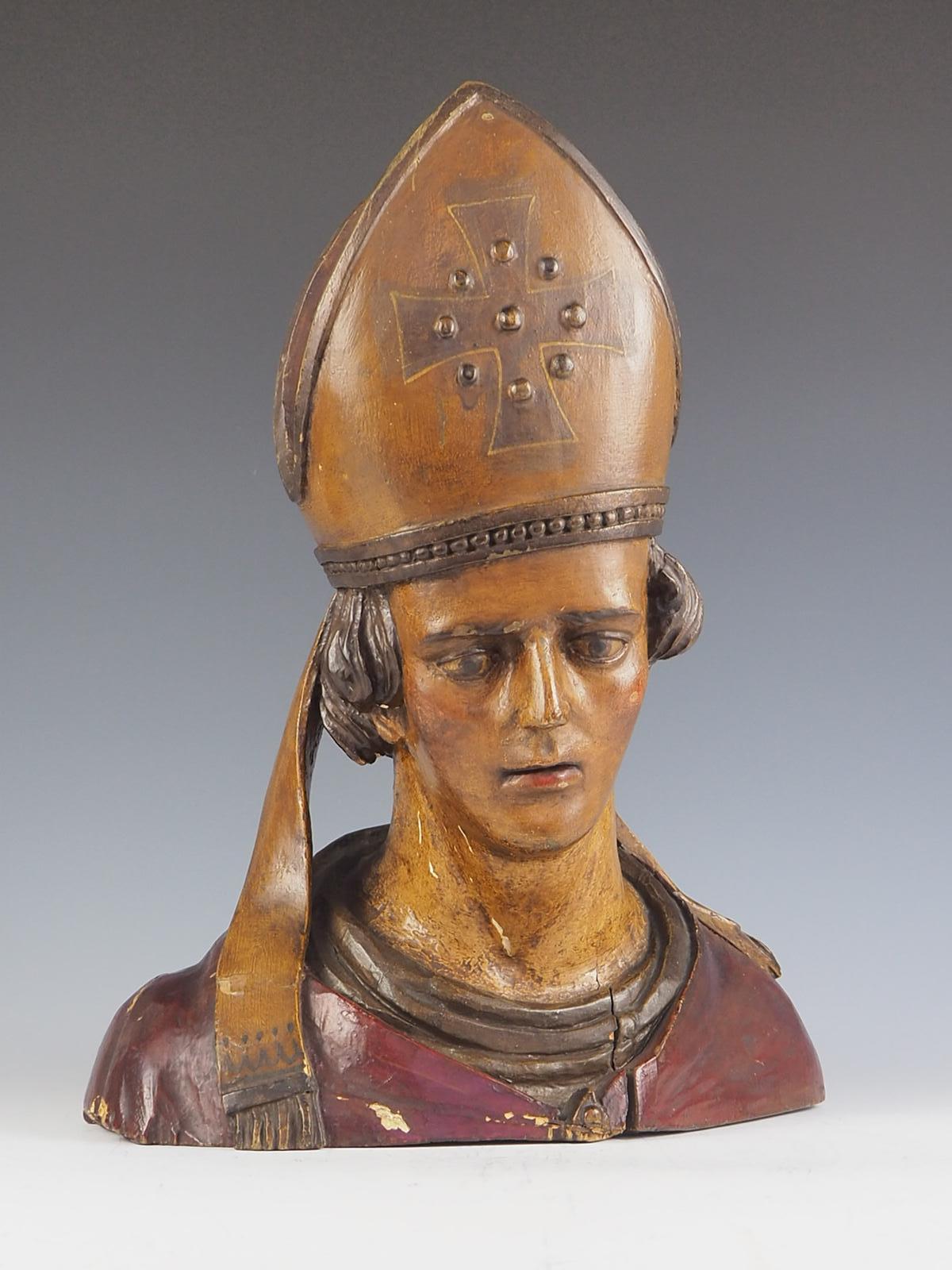 18th Century Bust of a Bishop finished in polychrome.

The shape of the bust would suggest that it was originally part of a full-length figure.