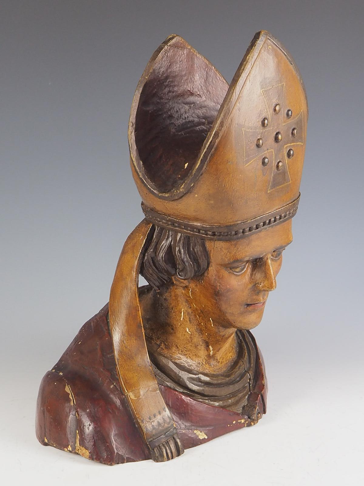 Wood 18th Century Bust of a Bishop finished in polychrome.   For Sale
