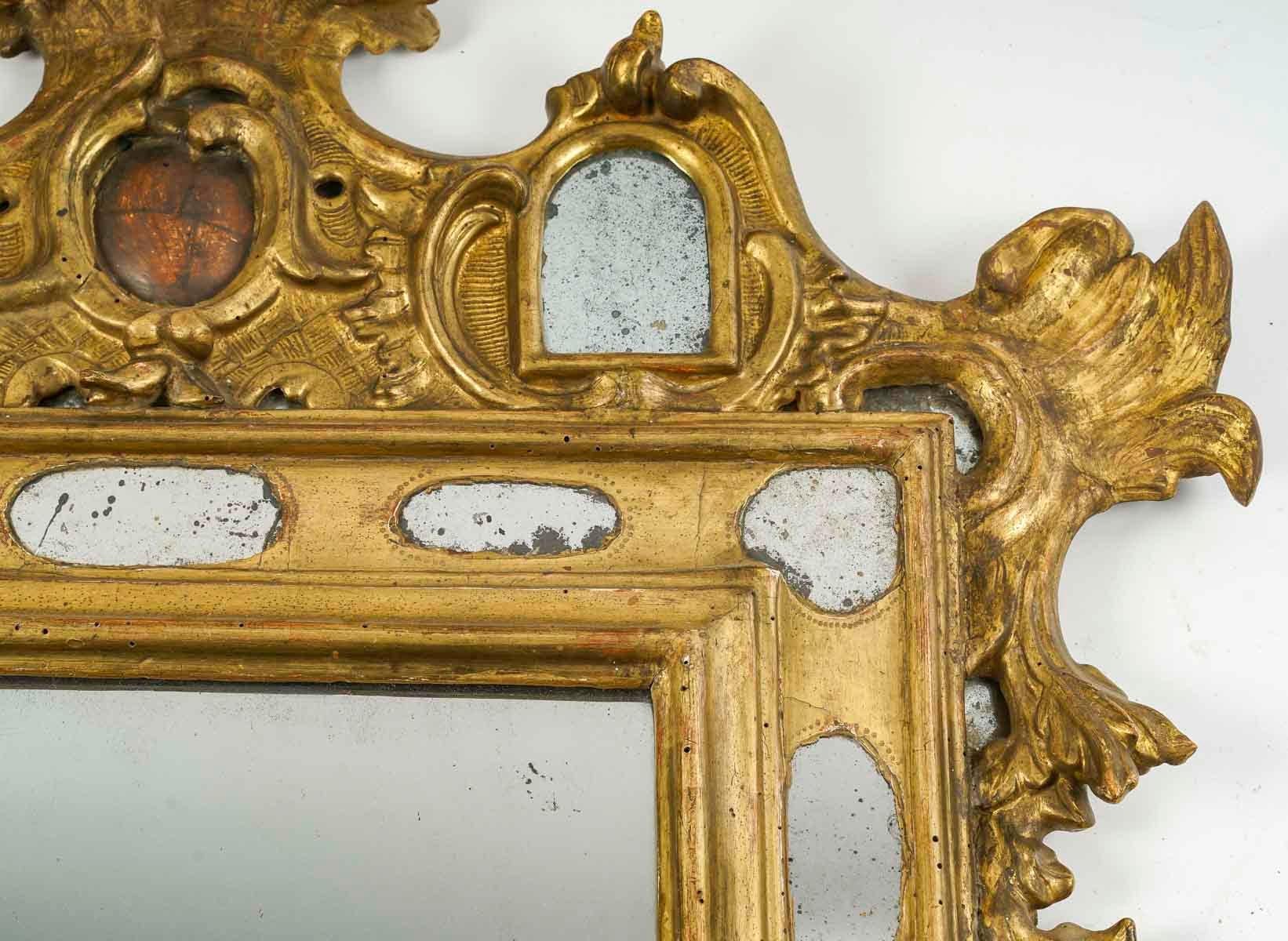 Baroque 18th Century Carved and Gilded Wood Mirror. For Sale