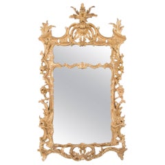 Miroir Chippendale anglais en bois sculpté et doré du 18ème siècle, de grande taille