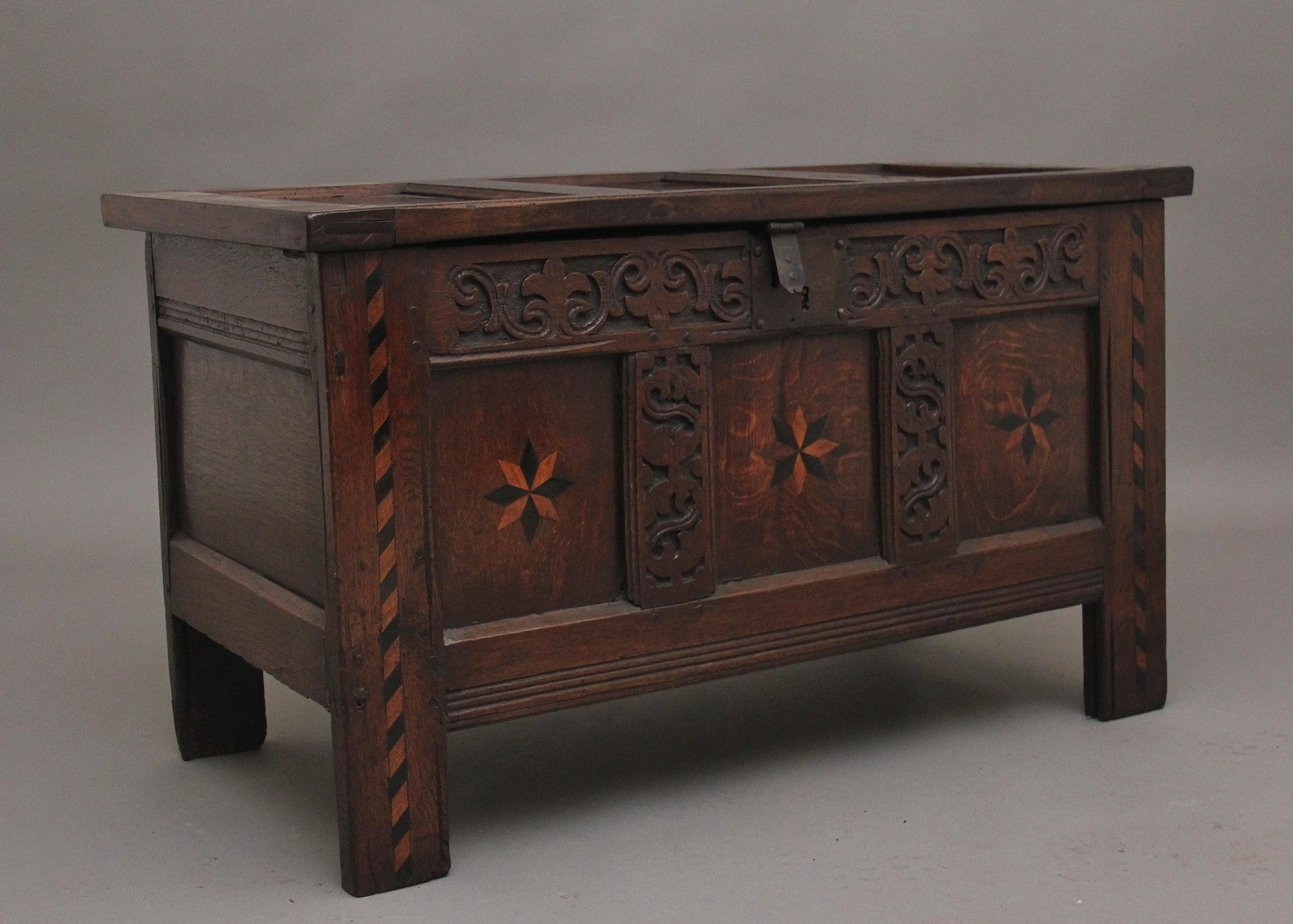 Oak 18th Century carved and inlaid oak coffer For Sale
