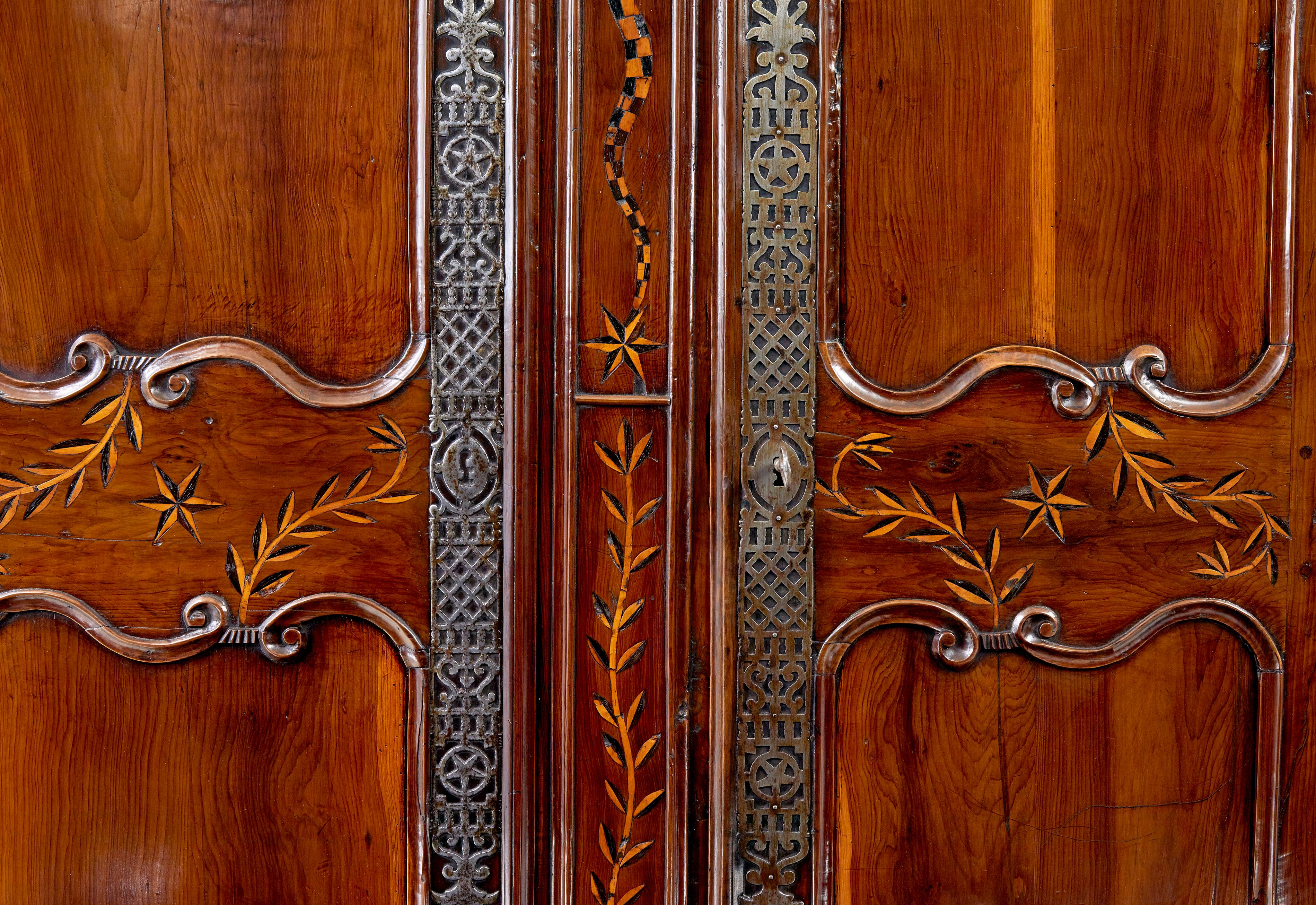 18th Century 18th century carved French yew and chestnut armoire For Sale
