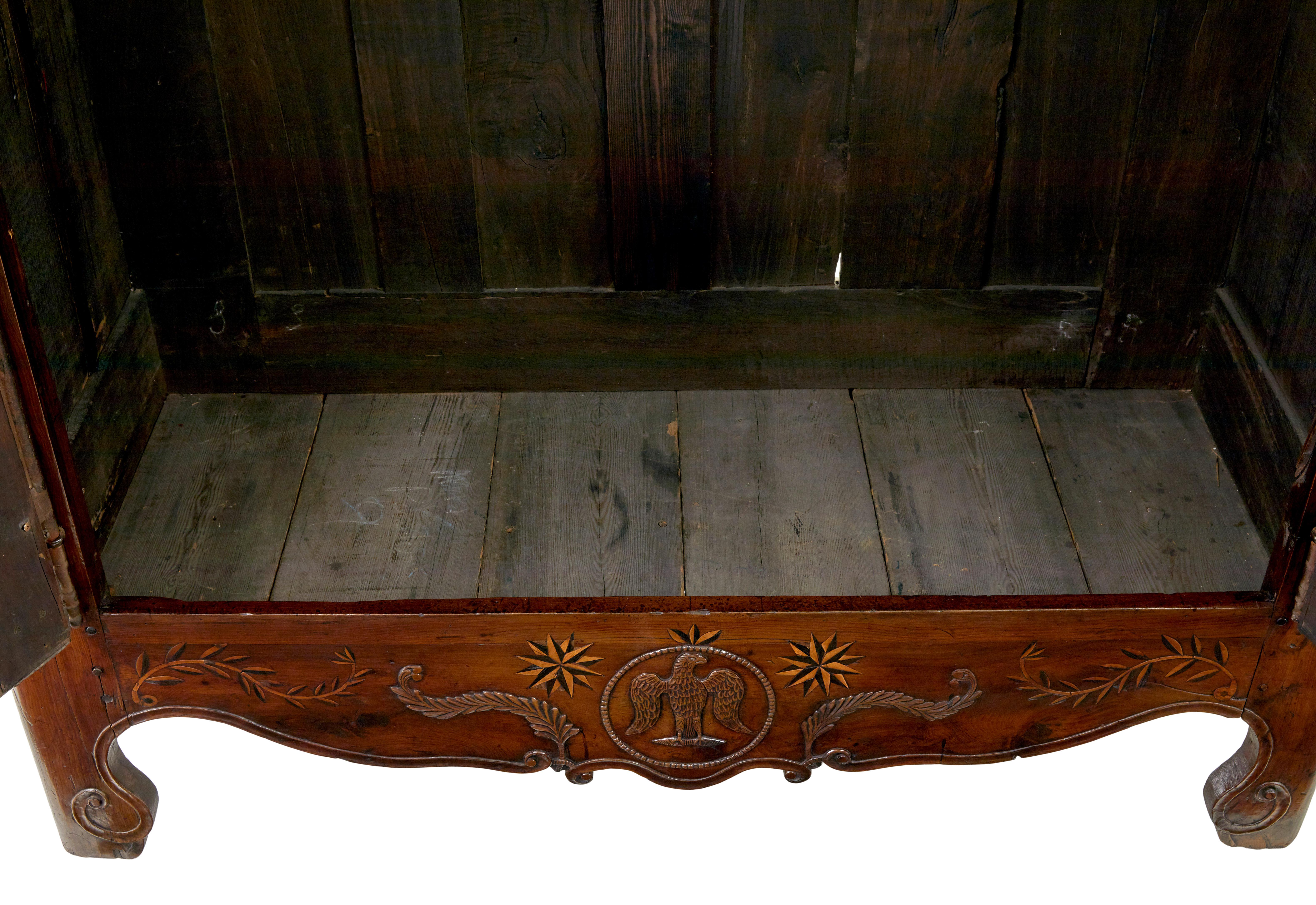 18th century carved French yew and chestnut armoire For Sale 2