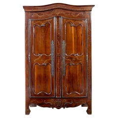 18th century carved French yew and chestnut armoire