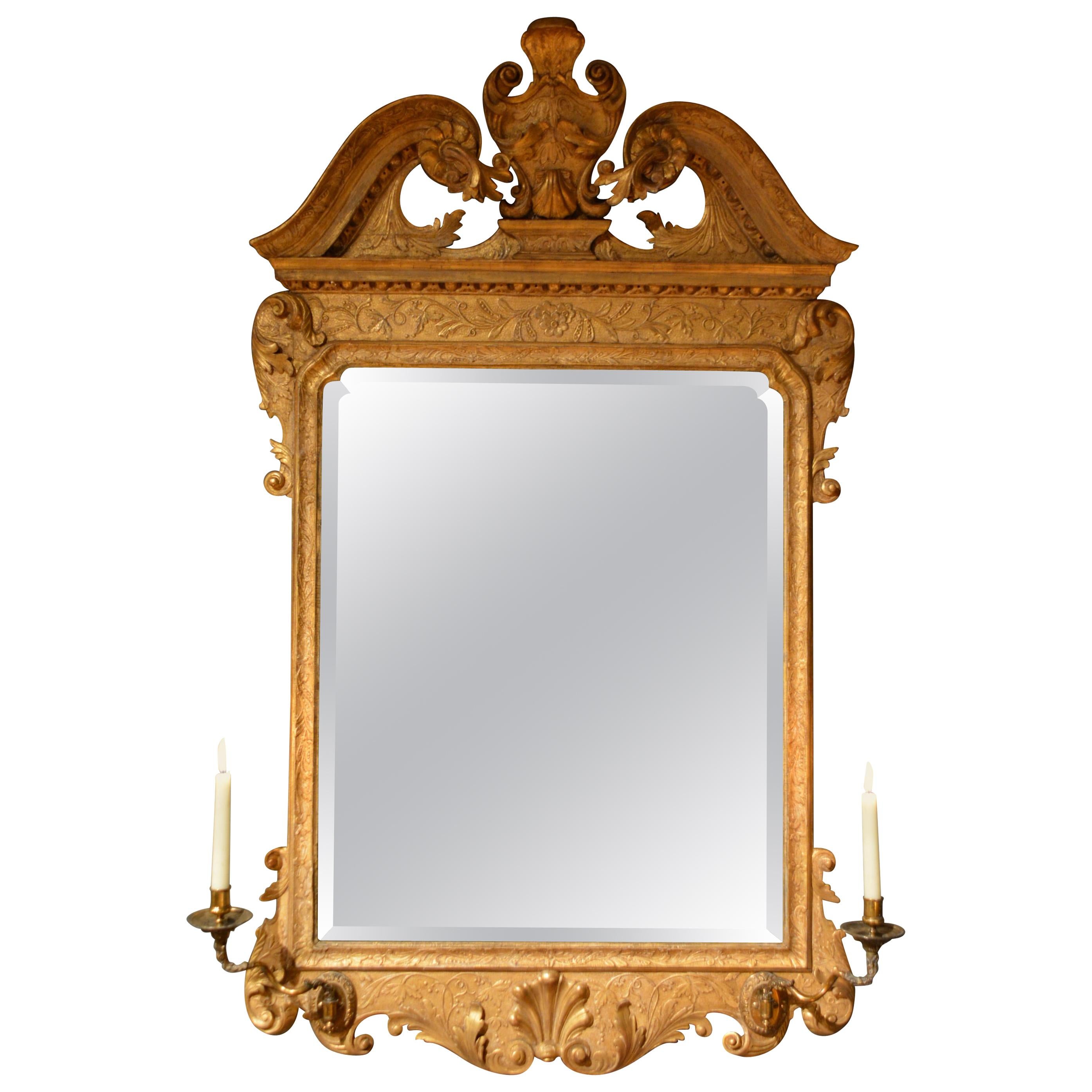 18th Century Carved Giltwood Gesso Mirror with Candle Sconces For Sale