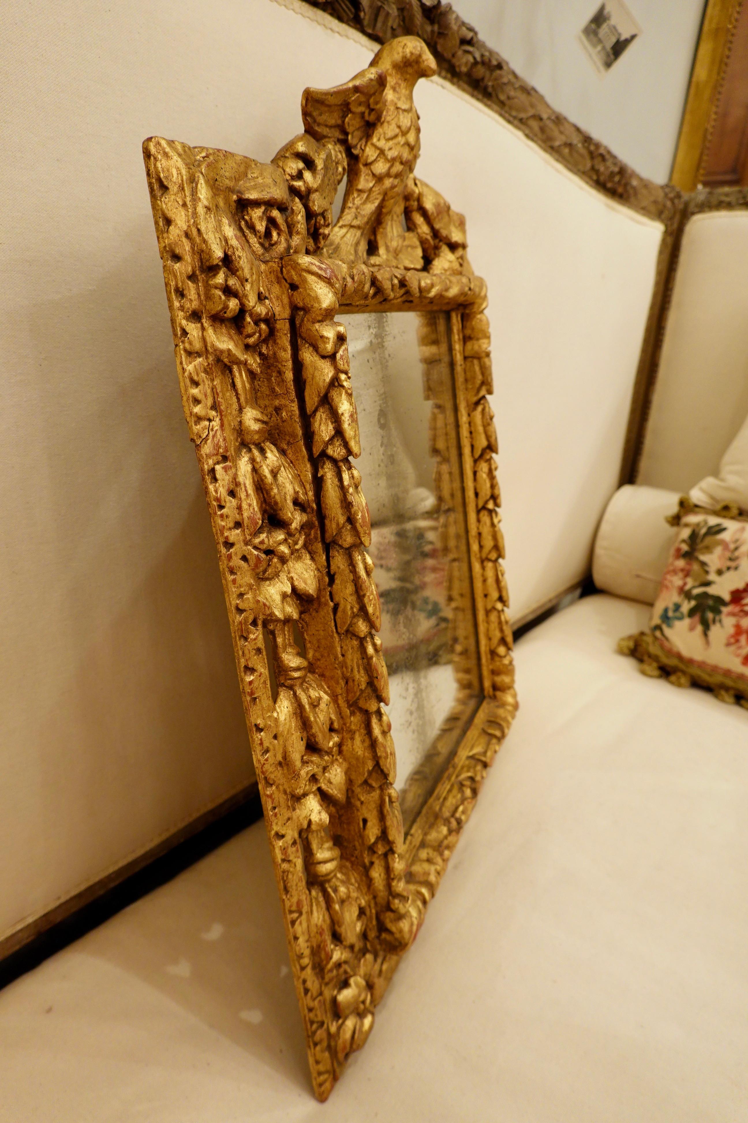 18th Century Carved Giltwood Mirror with Eagle, Roses and Leaves For Sale 3