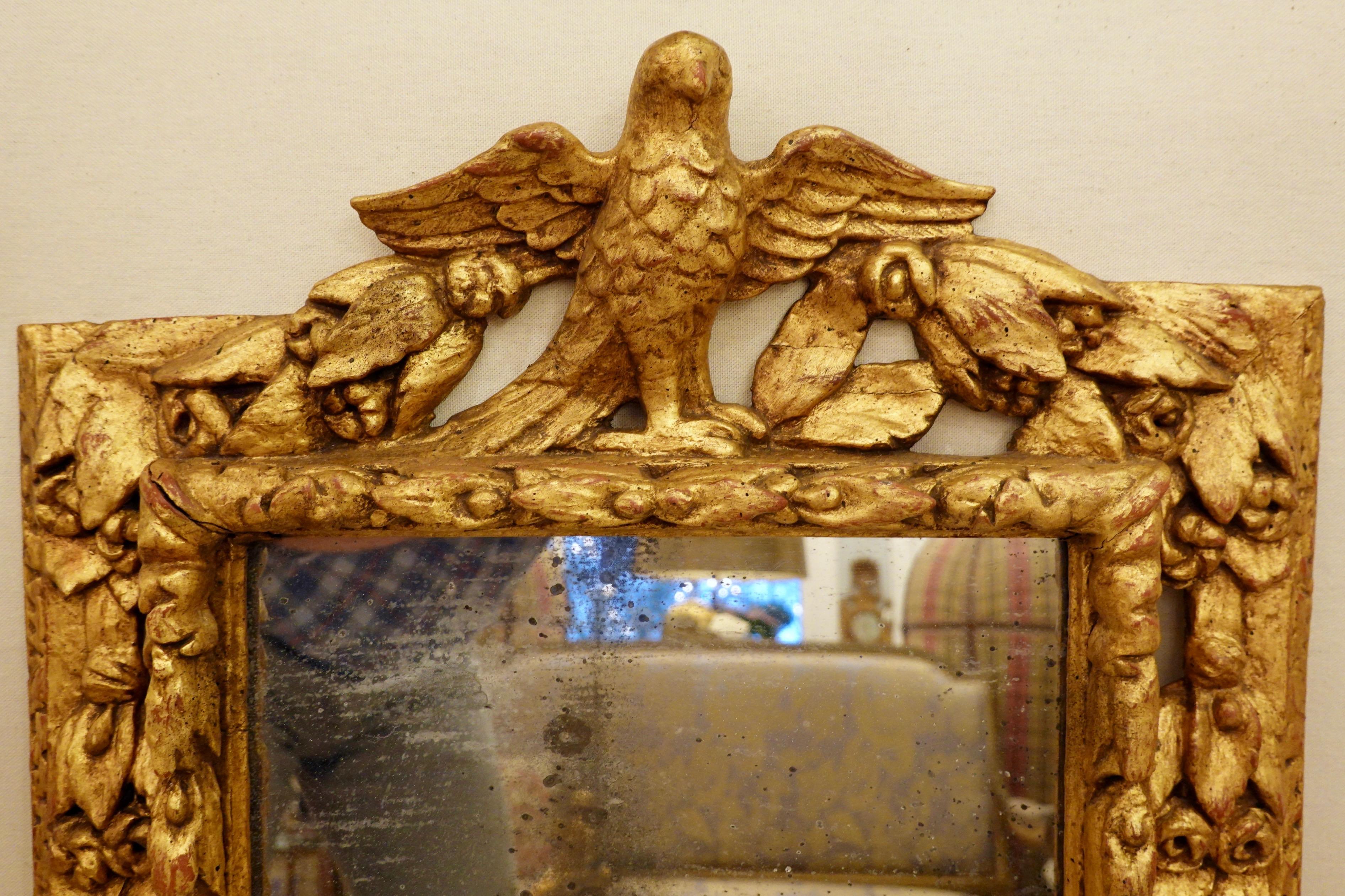 18th Century Carved Giltwood Mirror with Eagle, Roses and Leaves In Fair Condition For Sale In Pembroke, MA