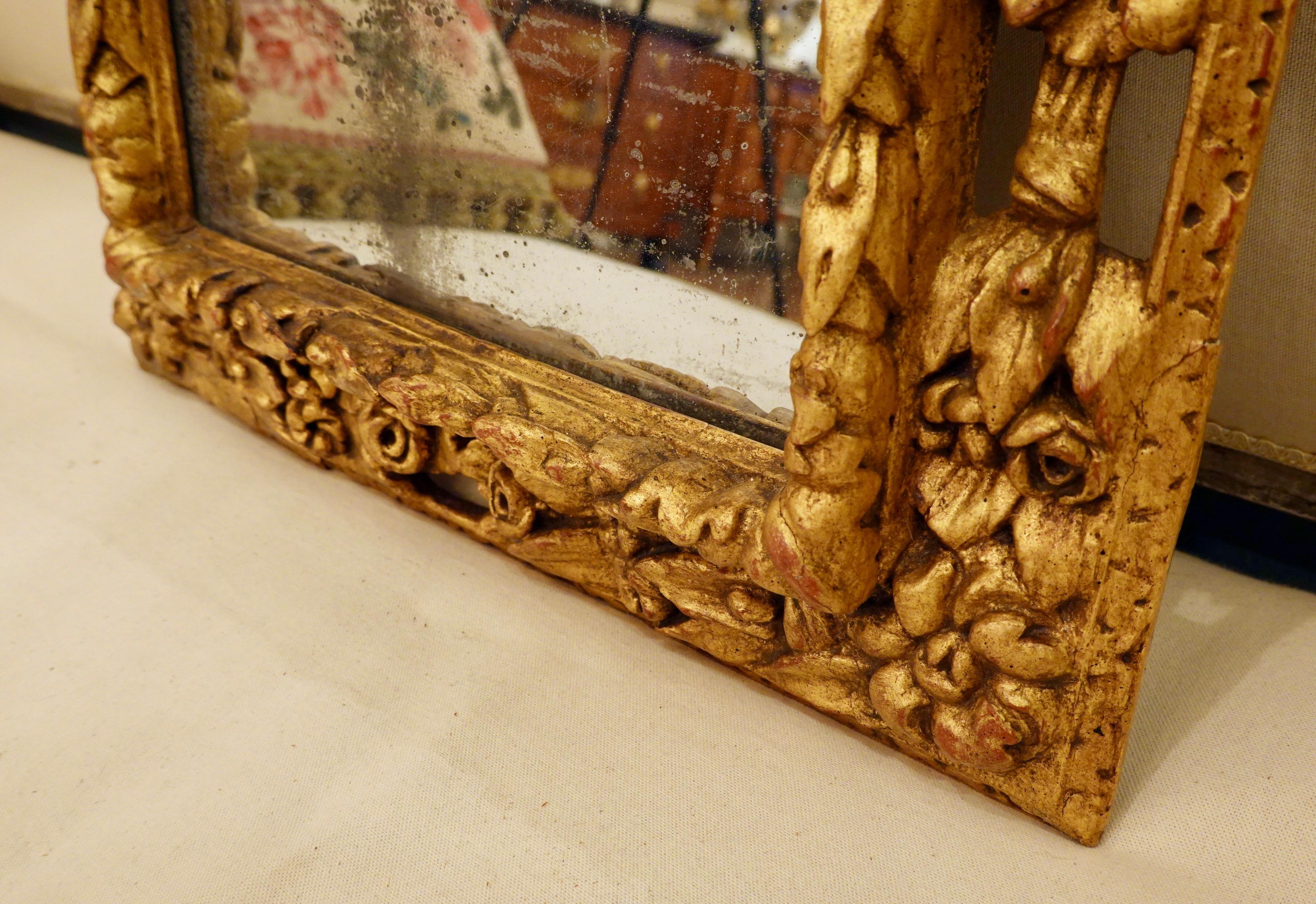 18th Century Carved Giltwood Mirror with Eagle, Roses and Leaves For Sale 2