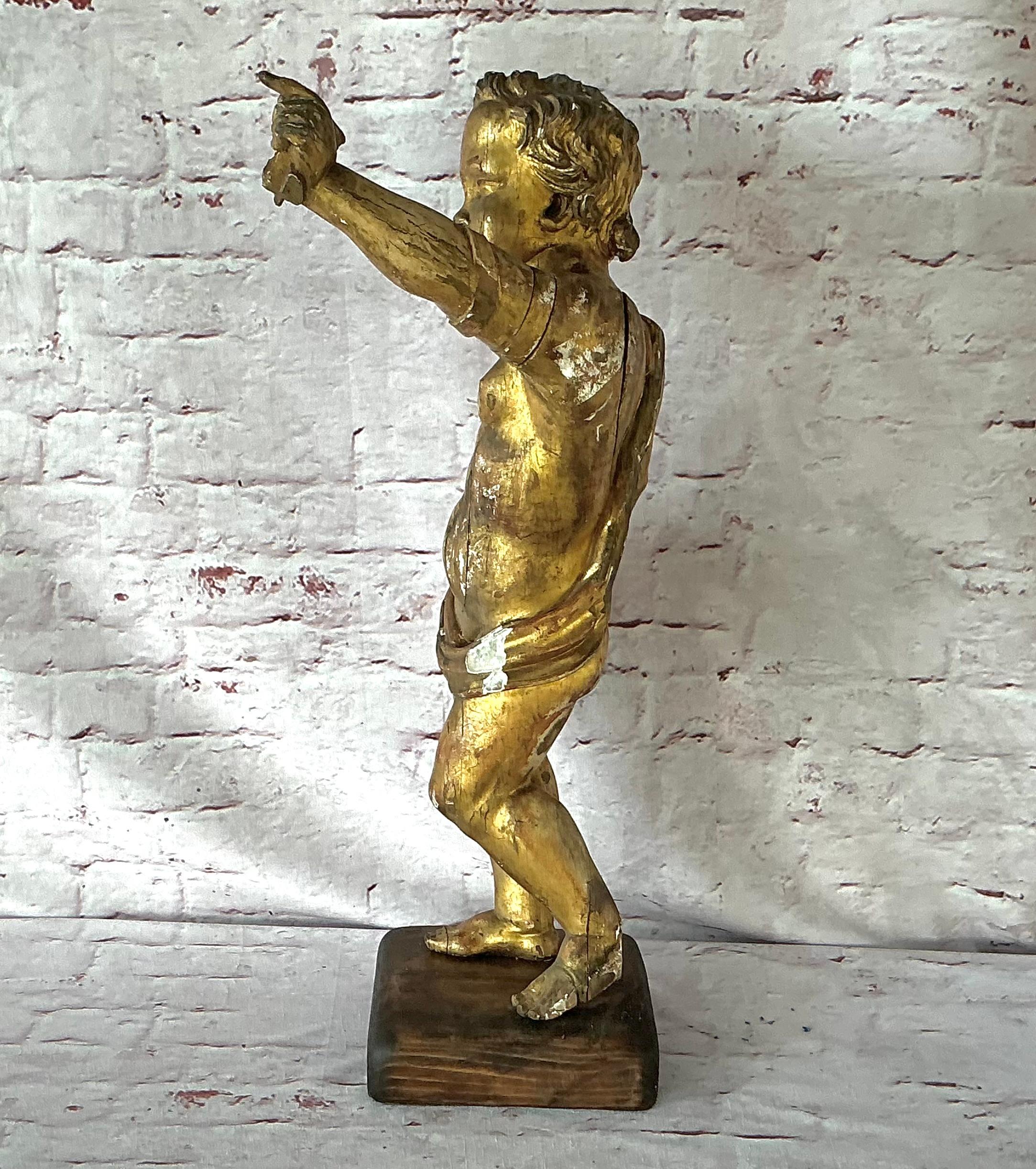 18th Century and Earlier 18th Century Carved Giltwood Putti Figure on Stand For Sale