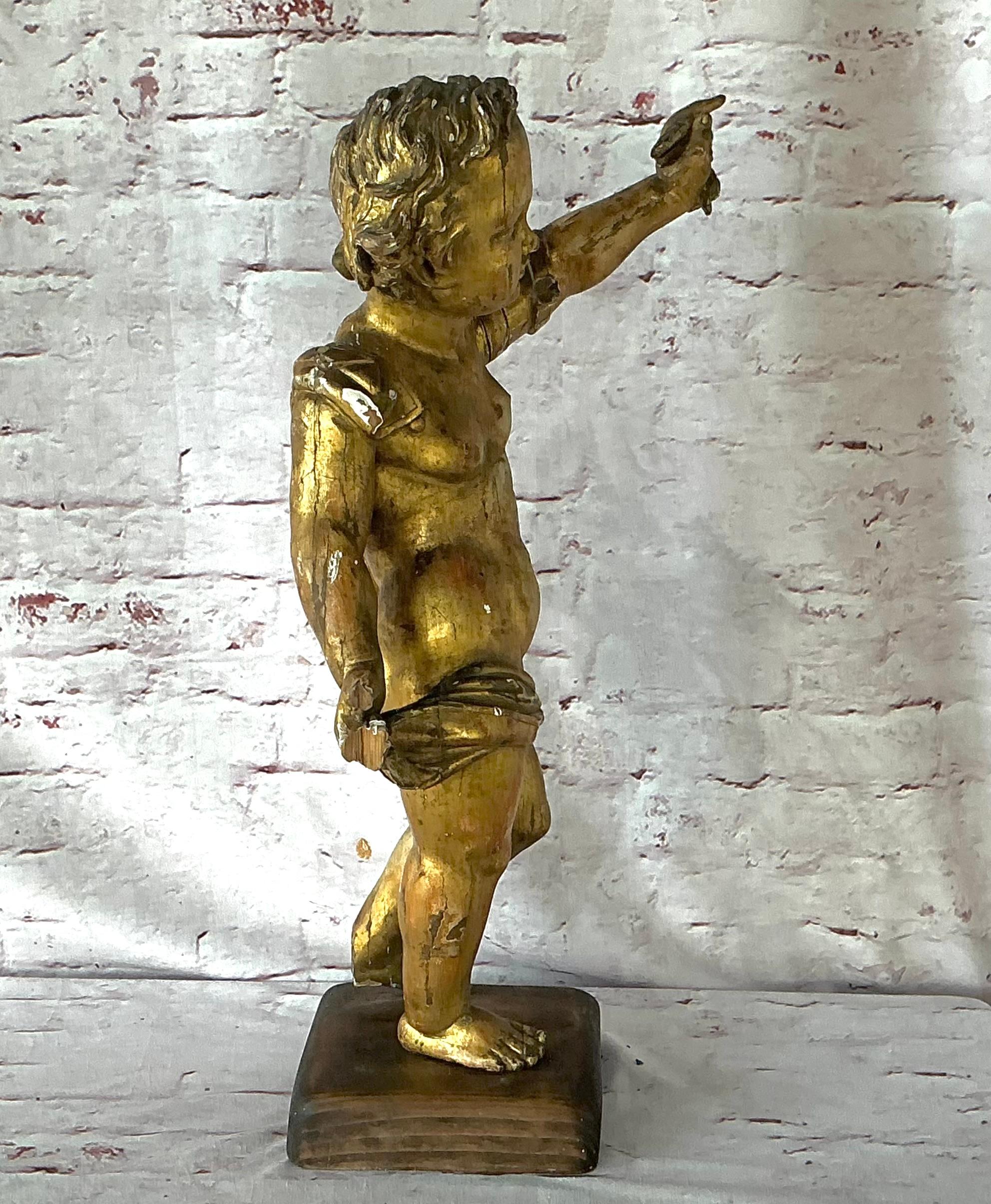 Wood 18th Century Carved Giltwood Putti Figure on Stand For Sale