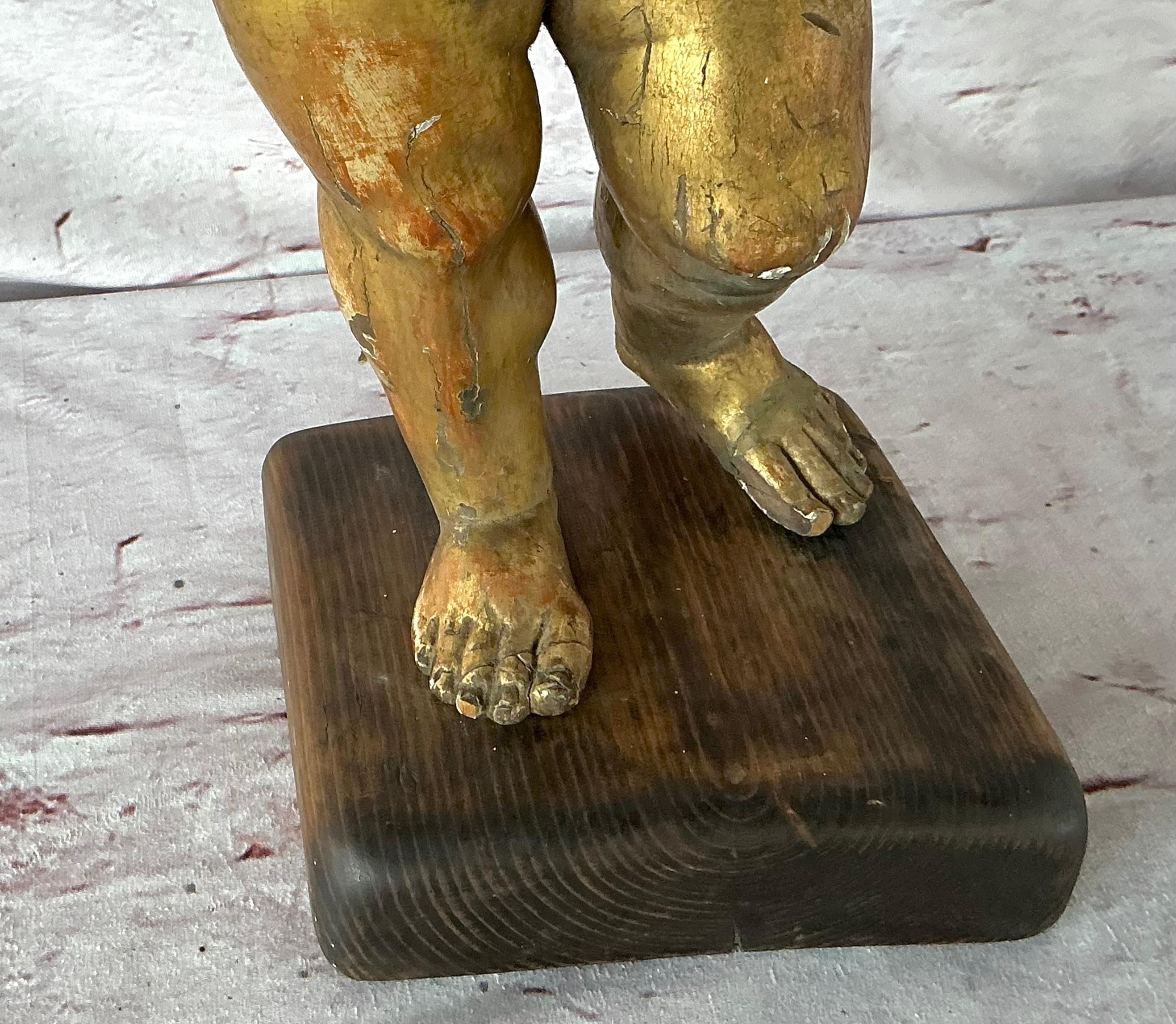 Baroque 18th Century Carved Giltwood Putti Figure on Stand For Sale