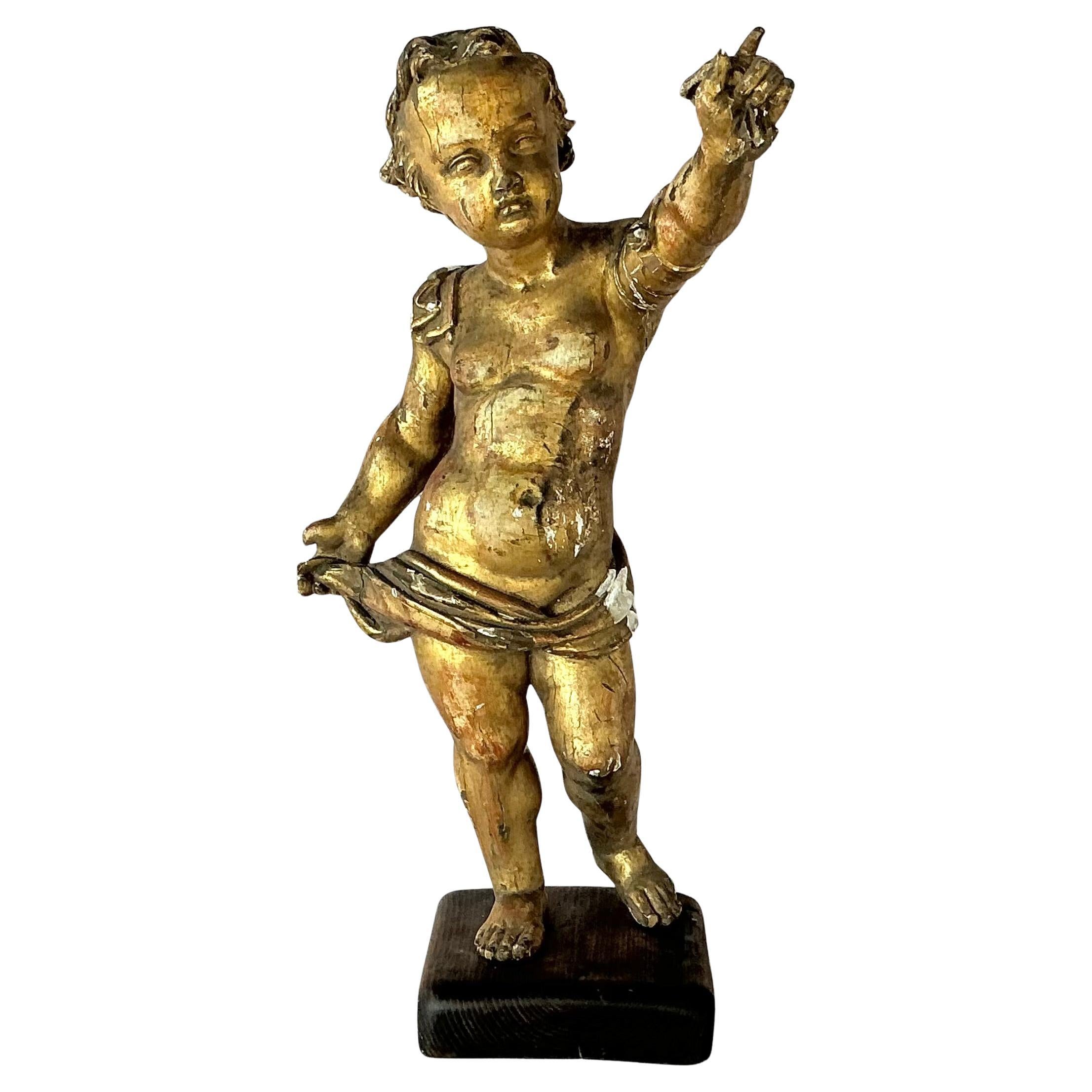18th Century Carved Giltwood Putti Figure on Stand For Sale