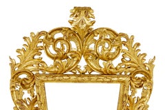 Espejo dorado rococó italiano tallado del siglo XVIII