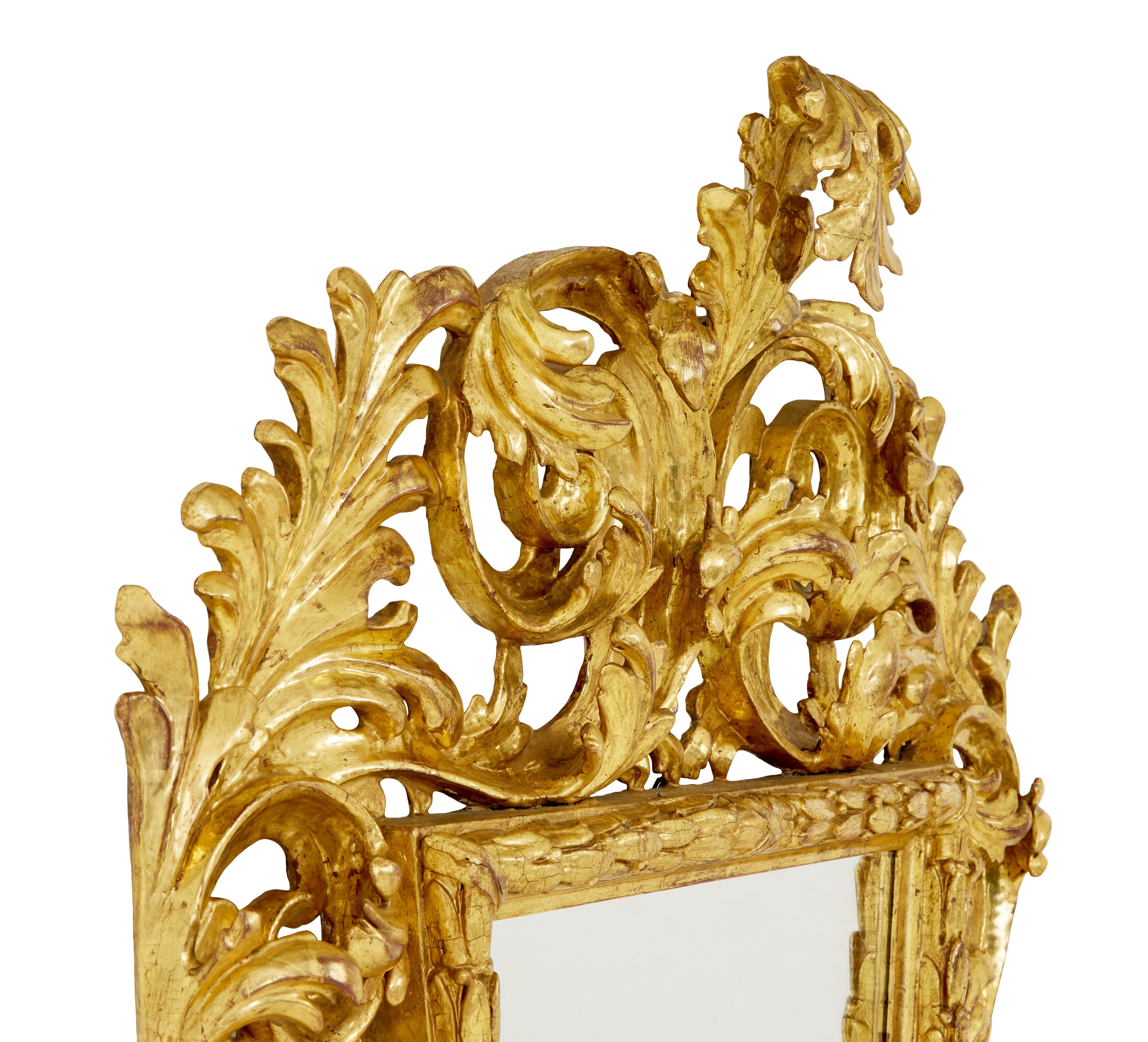 Carved 18th century carved Italian rococo giltwood mirror For Sale