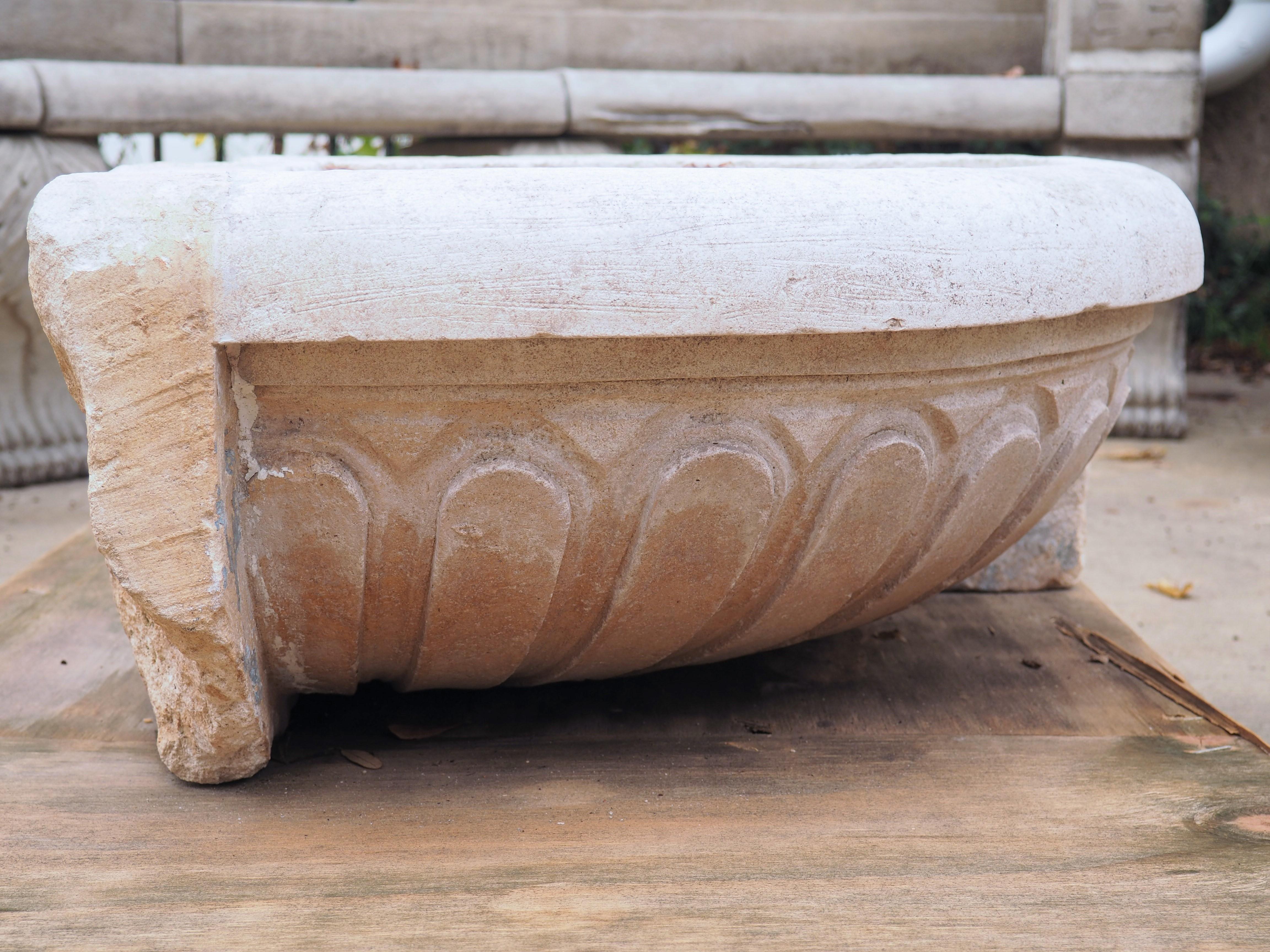 French 18th Century Carved Limestone Corner Sink or Fountain Basin from Apt, France For Sale