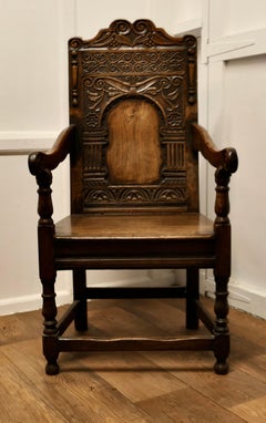 18th Century Carved Oak Celtic Wainscot Chair  This is a Handsome Chair