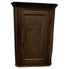 18th Century  Carved Oak Corner Cupboard