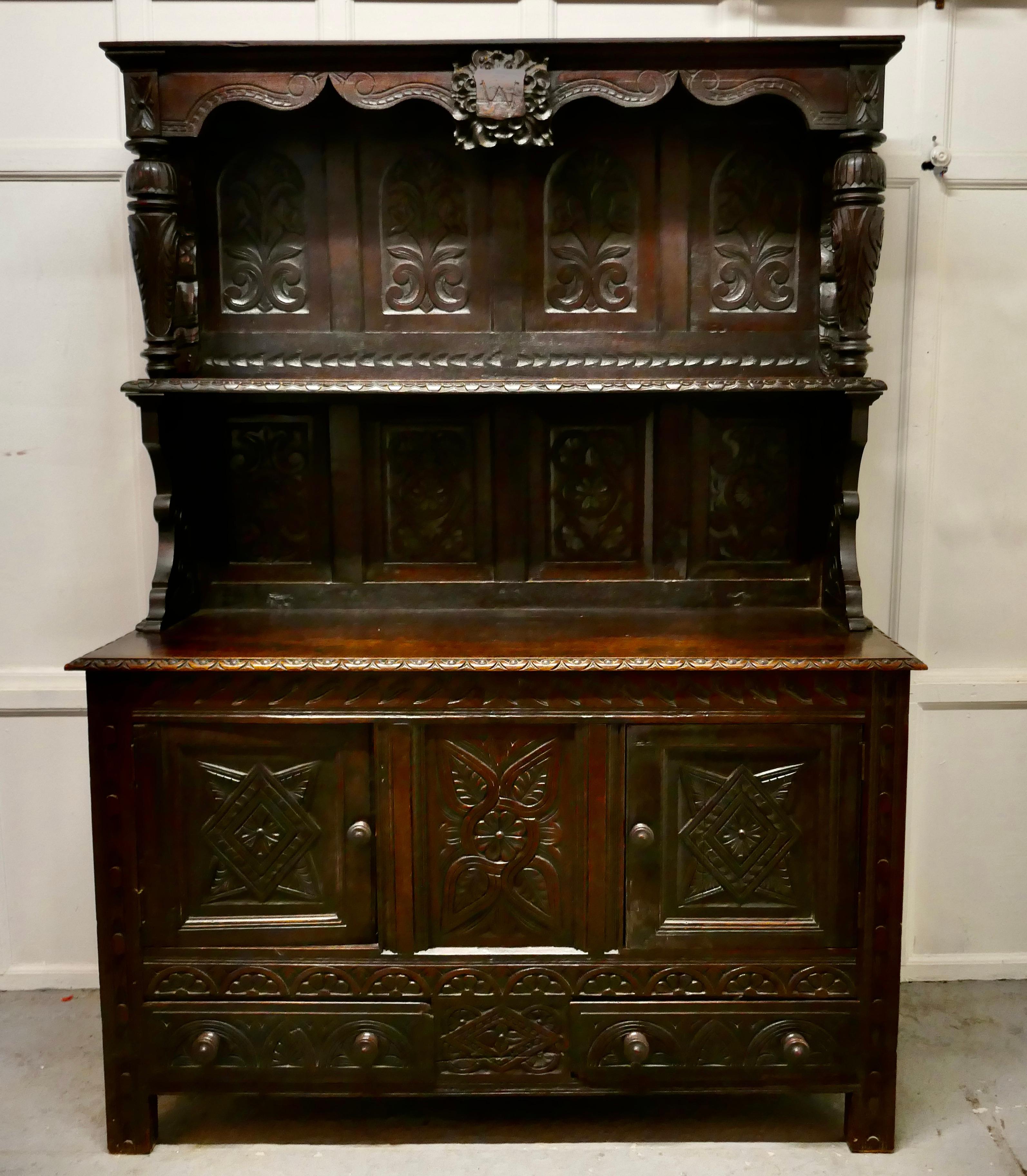 Gothic 18th Century Carved Oak Dresser with Kings   This is a handsome piece   For Sale